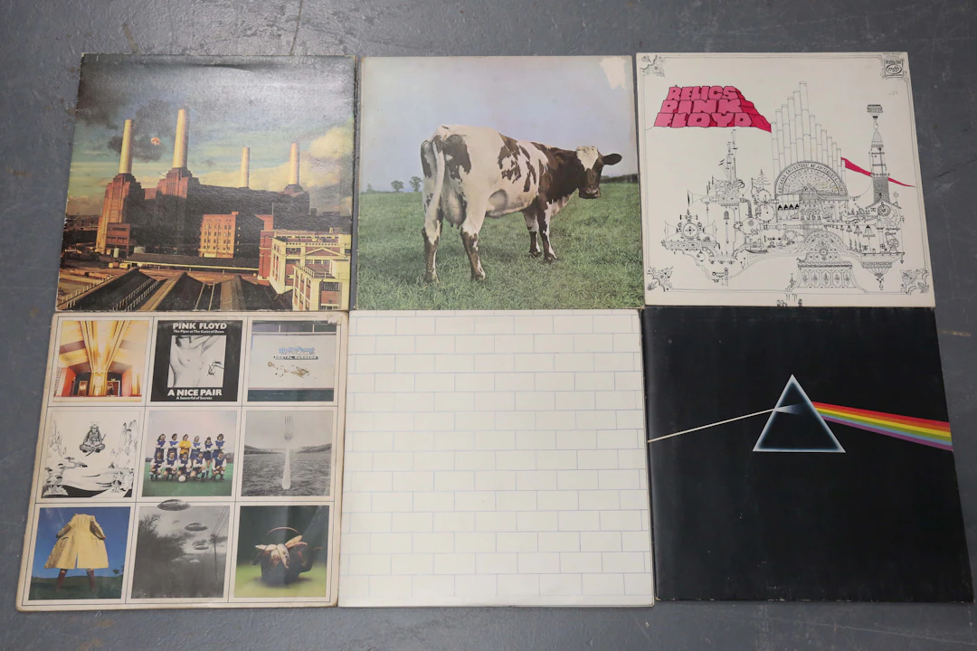 A small collection of LP records by Pink Floyd, including a Canadian