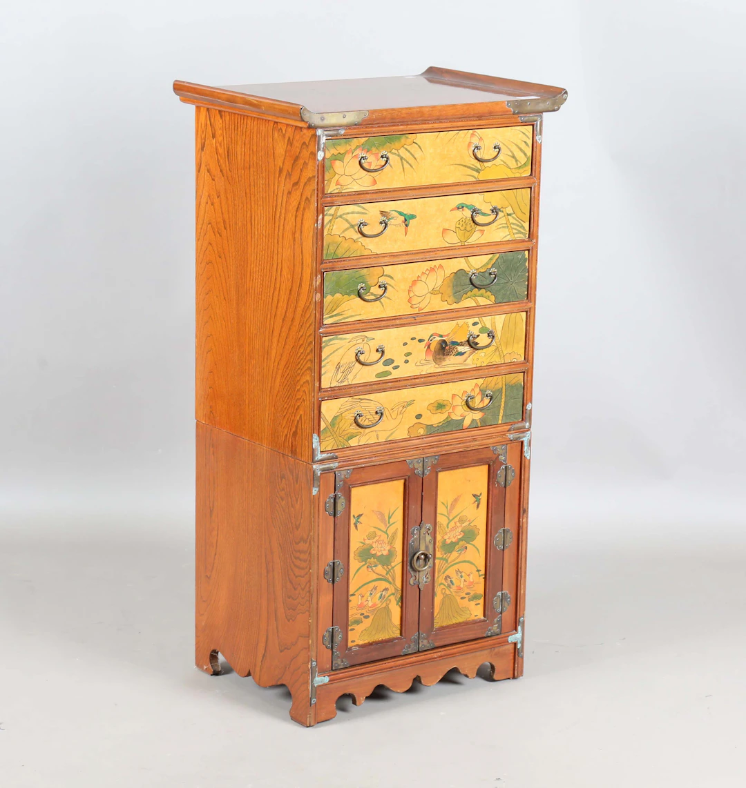 A late 20th century Chinese elm chest, fitted with five drawers and