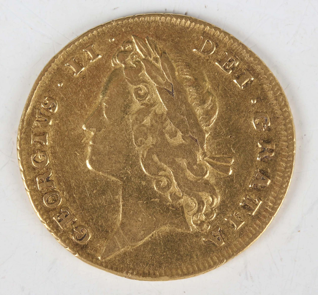 A scarce George II guinea 1732, young laureate head, Sp 3672 (good/fine).