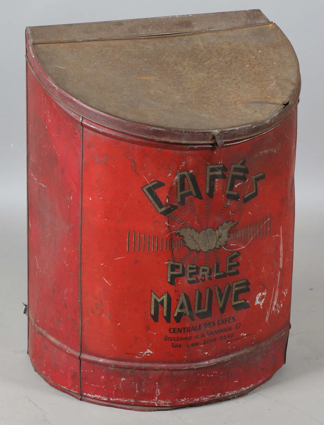 An early 20th century French tole painted tin advertising coffee bin