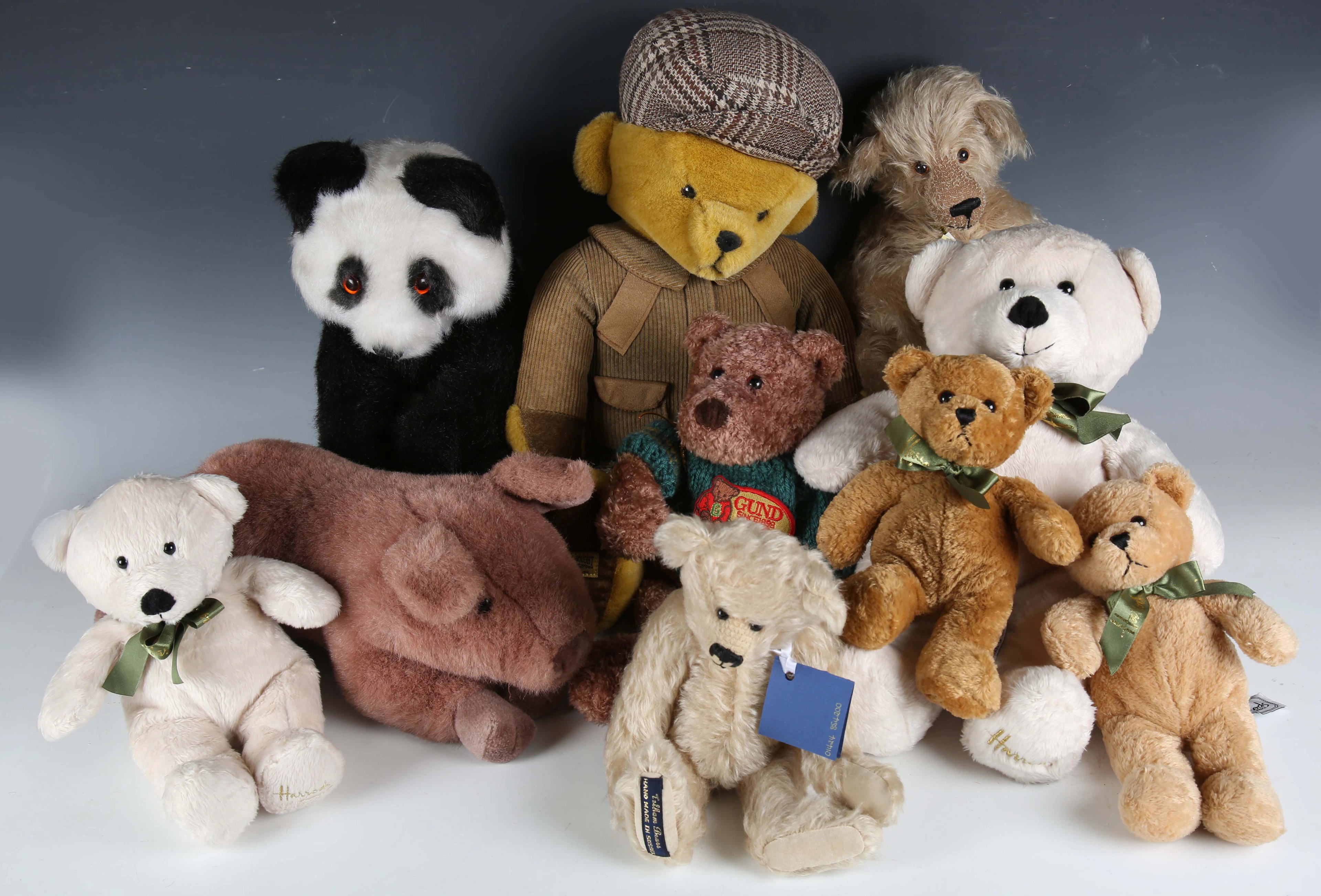 A group of modern teddy bears, including Merrythought Millenium bear