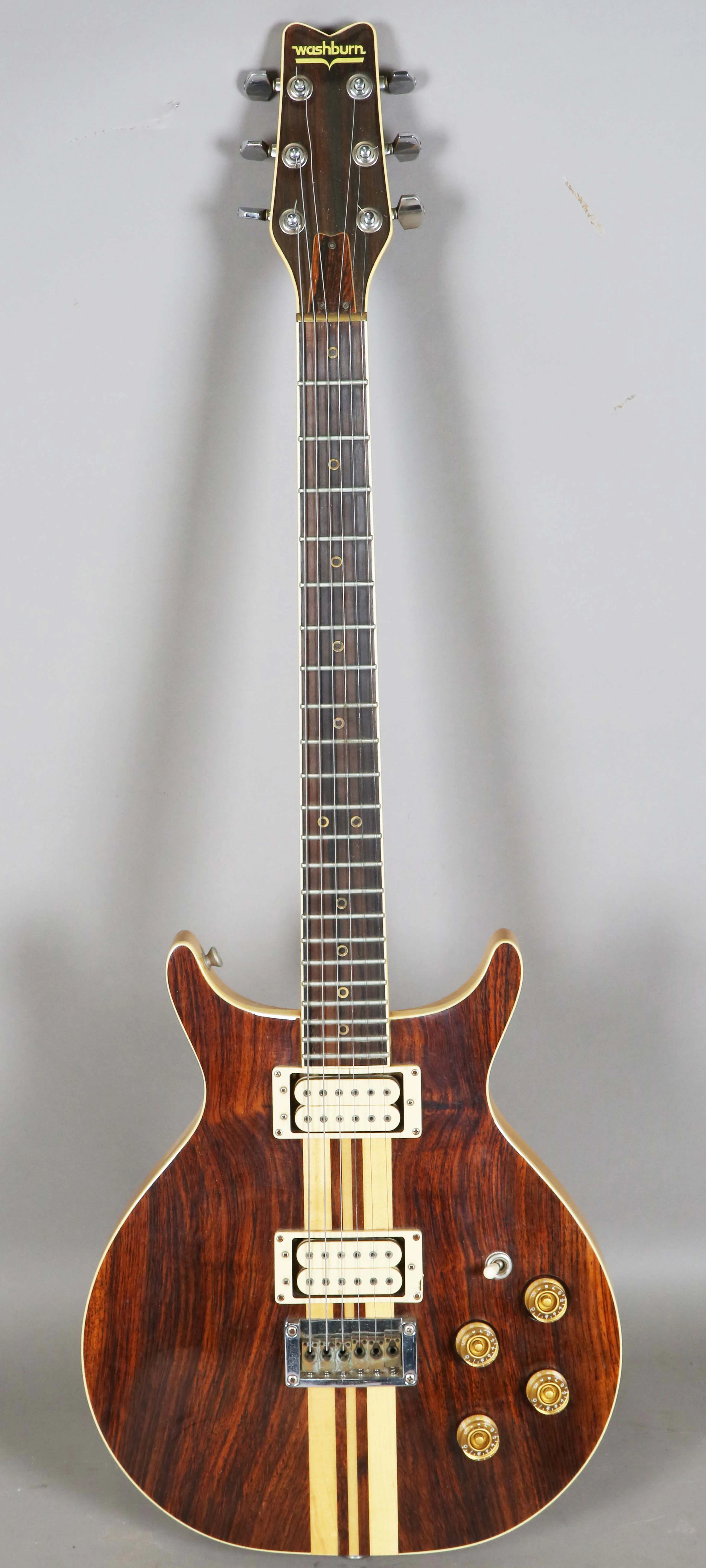 A Washburn solid body electric guitar with Indian rosewood front