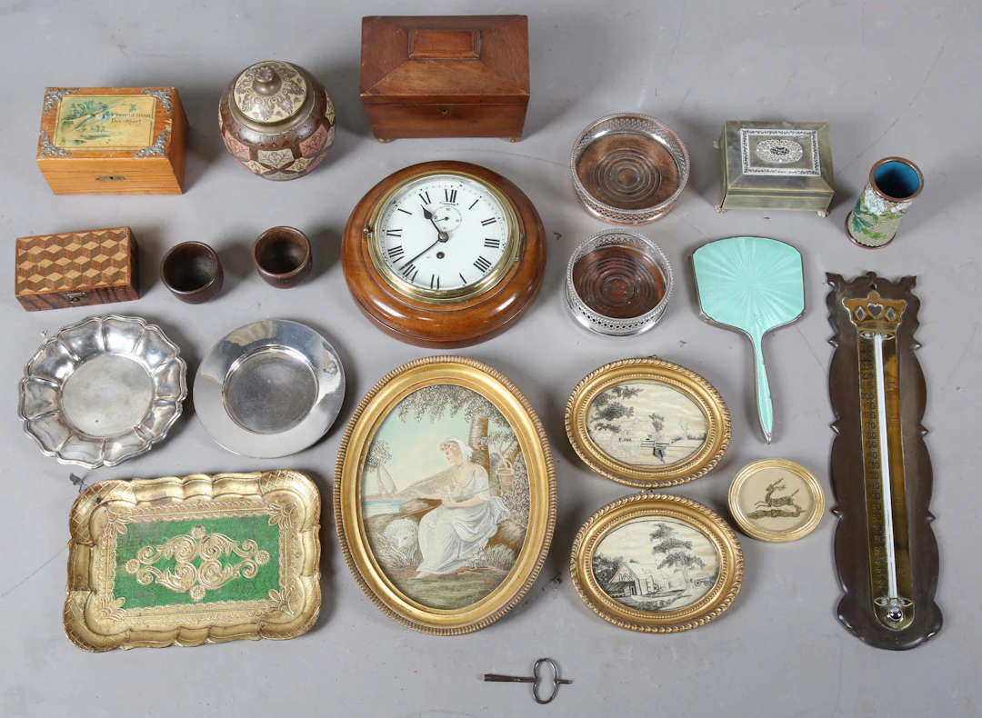A mixed group of collectors' items, including a Bakelite and brass