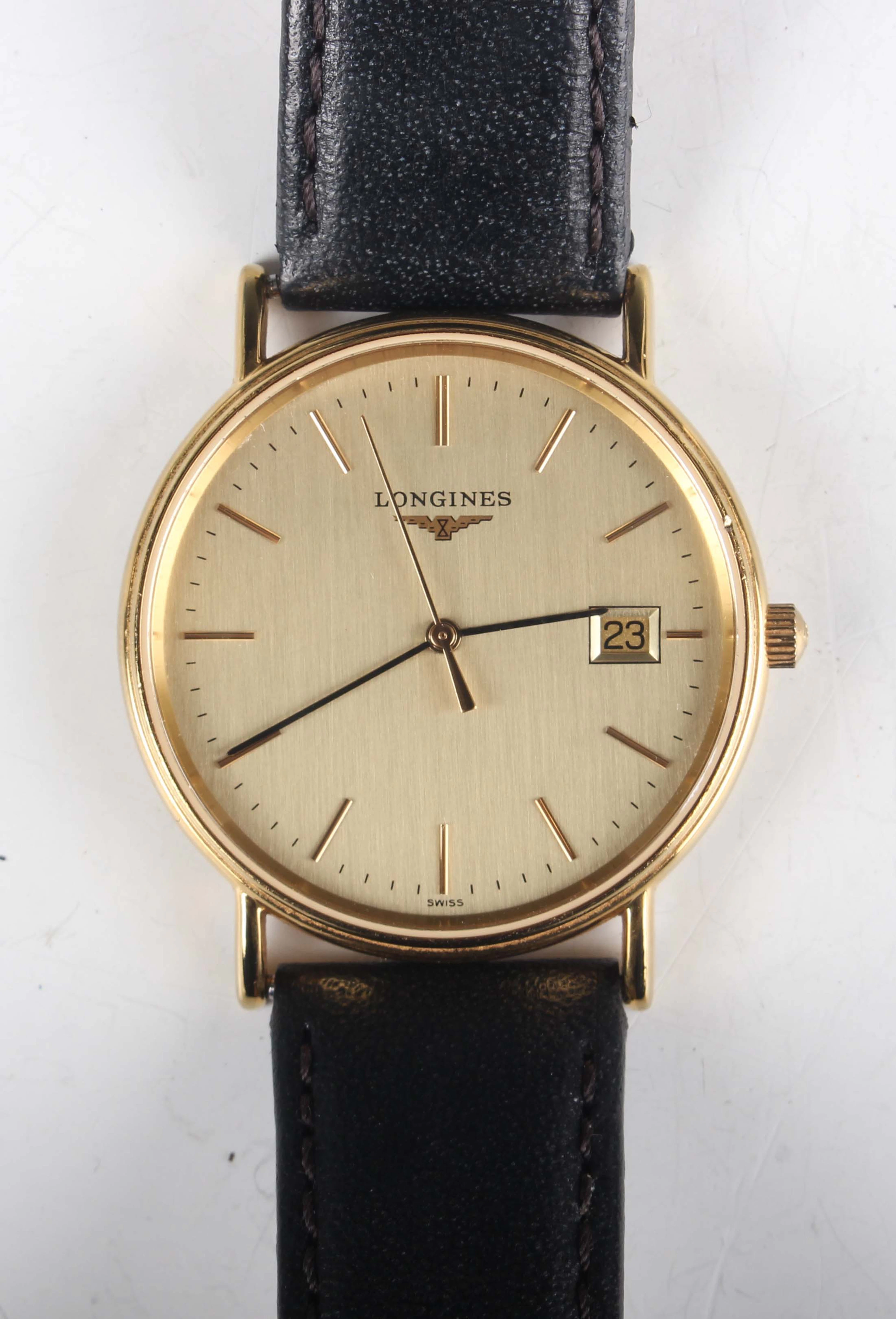 A Longines gilt metal fronted and steel backed circular cased gentleman's