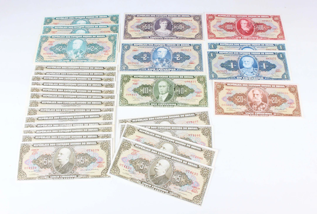 A large collection of Brazilian banknotes, including a collection
