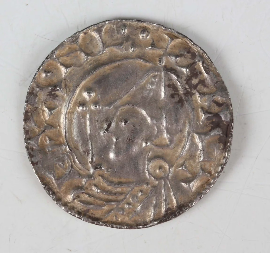A Cnut hammered silver penny 1016-1035, helmet type, moneyer Matdan