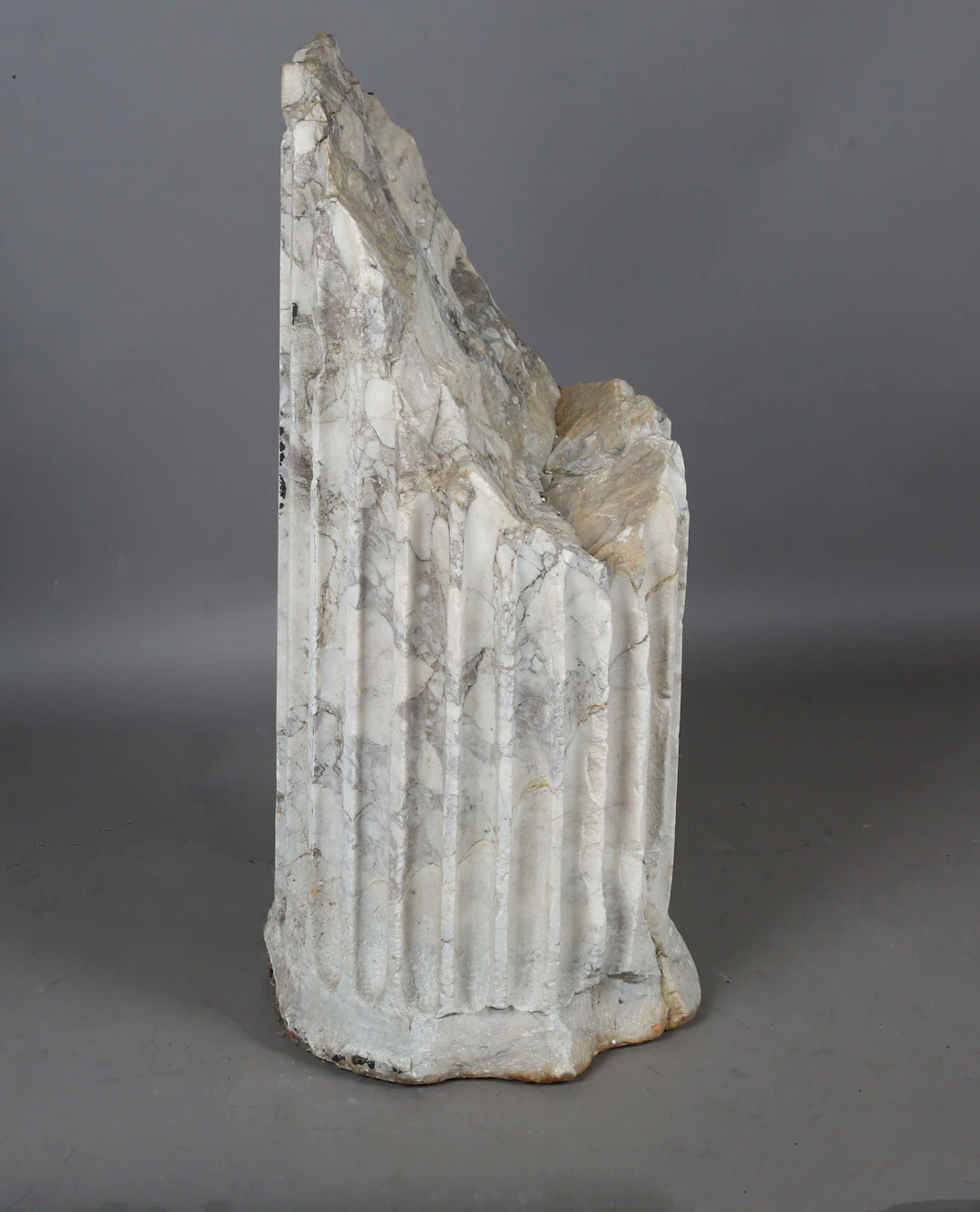 A monumental carved marble architectural column fragment, probably