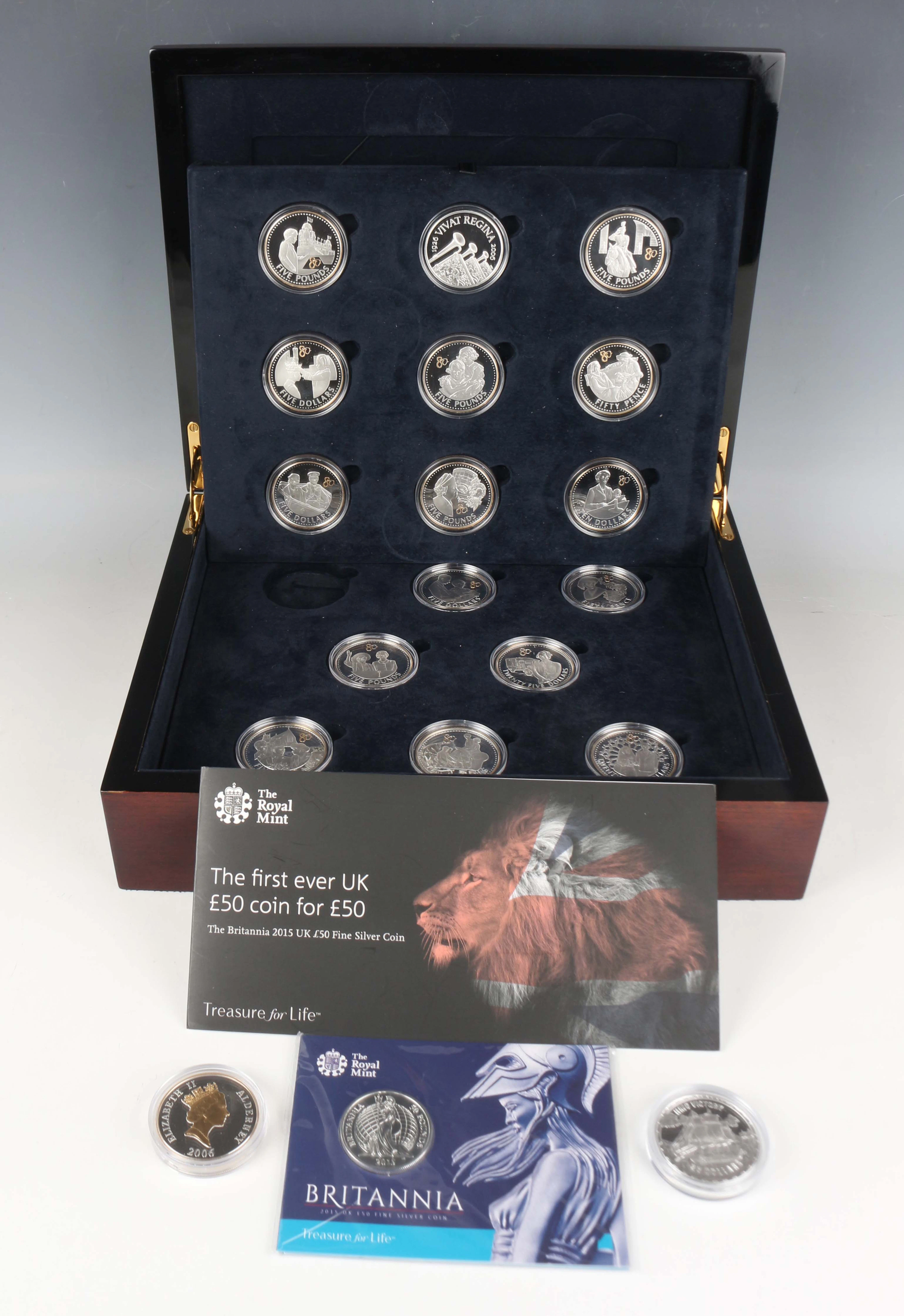 A part-set of sixteen Elizabeth II part-gilt-finished silver proof