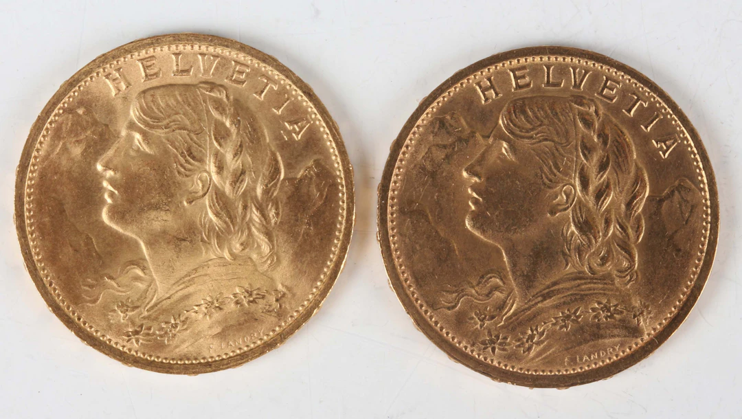 Two Switzerland gold twenty francs, 1909 and 1912, both Bern Mint.