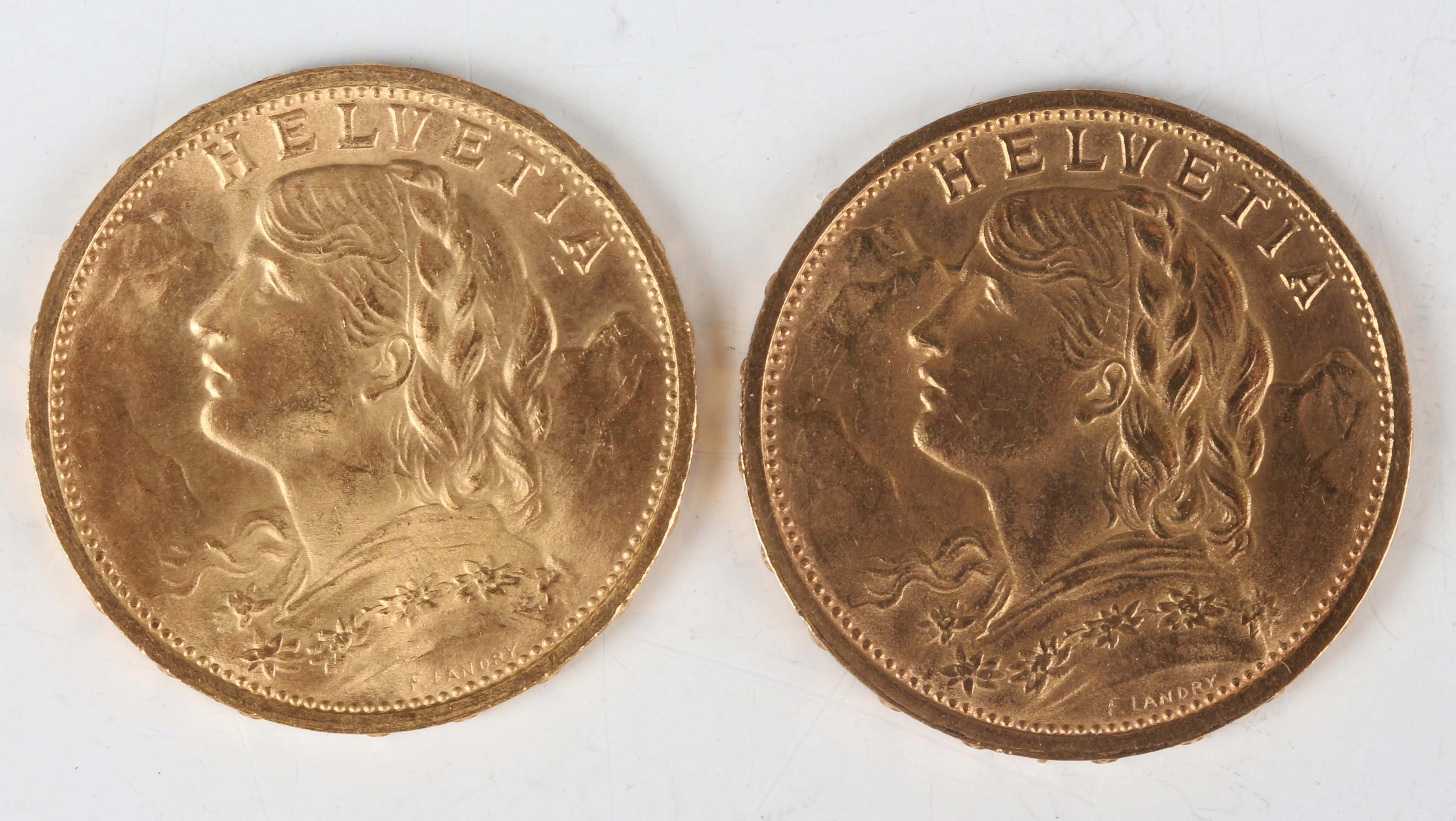 Two Switzerland gold twenty francs, 1909 and 1912, both Bern Mint.