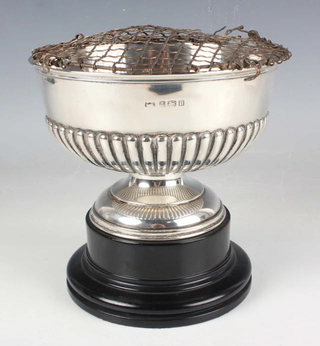 A George V silver circular half-reeded rose bowl on a circular domed