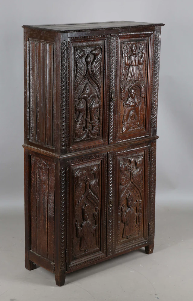 A 17th century and later Continental oak and softwood side cabinet