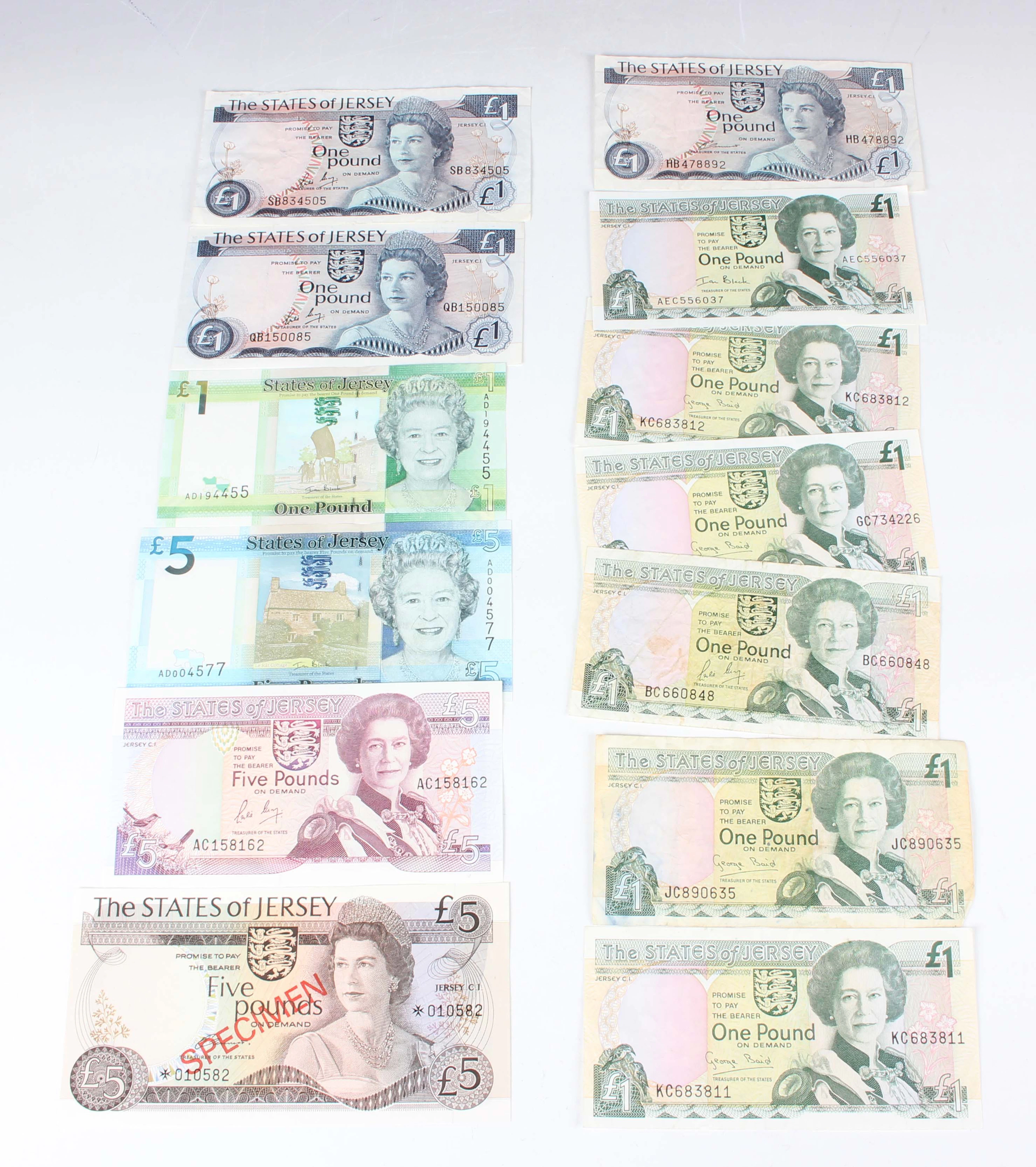 A small collection of Jersey and Guernsey banknotes, including an