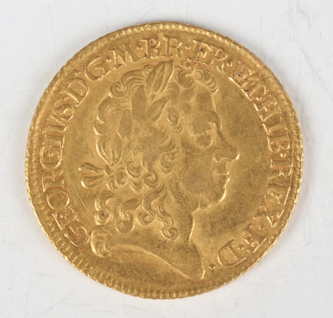 A scarce George I guinea 1719, fourth bust, tie with loop to hair