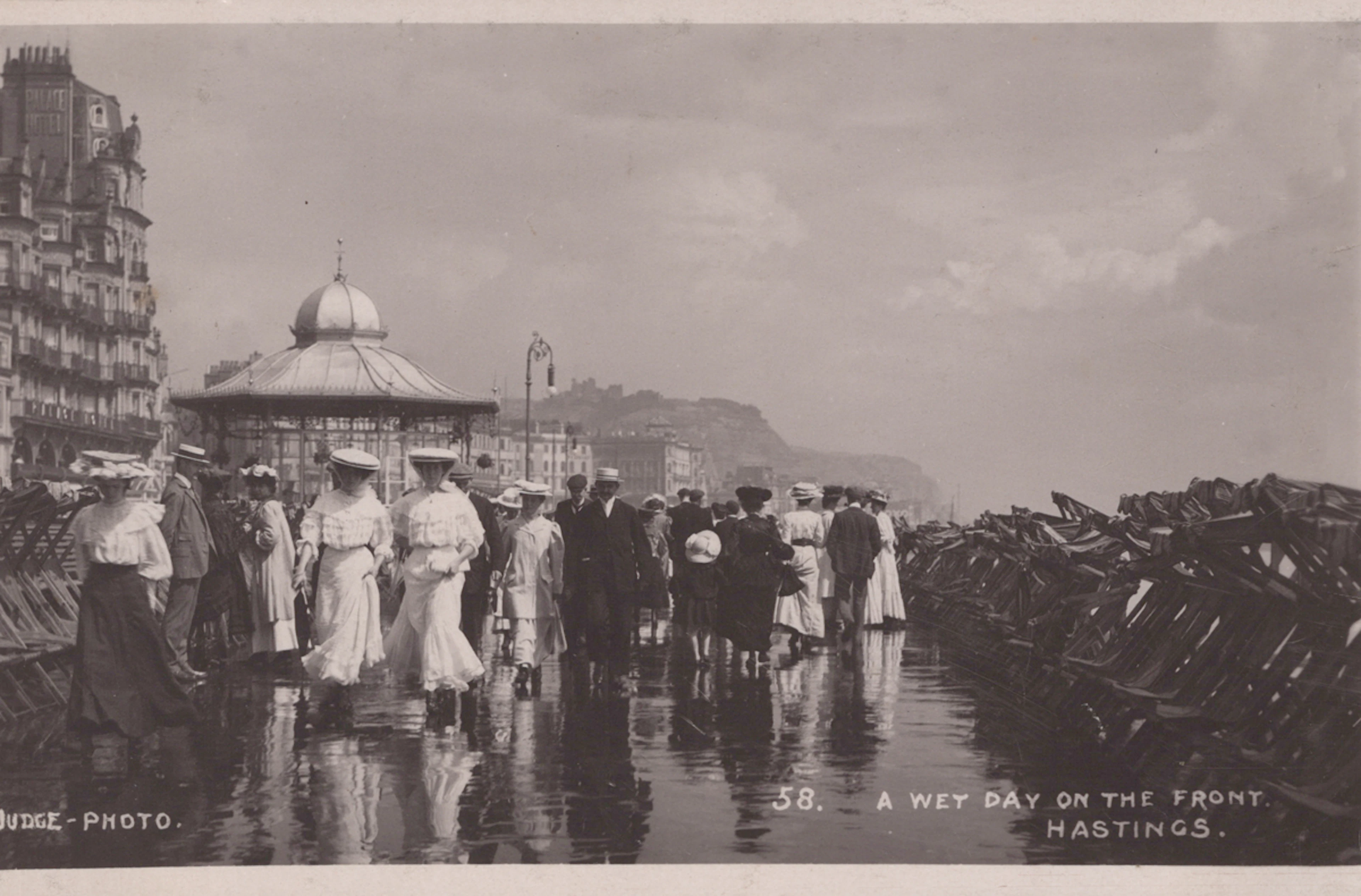 A collection of approximately 164 photographic postcards published