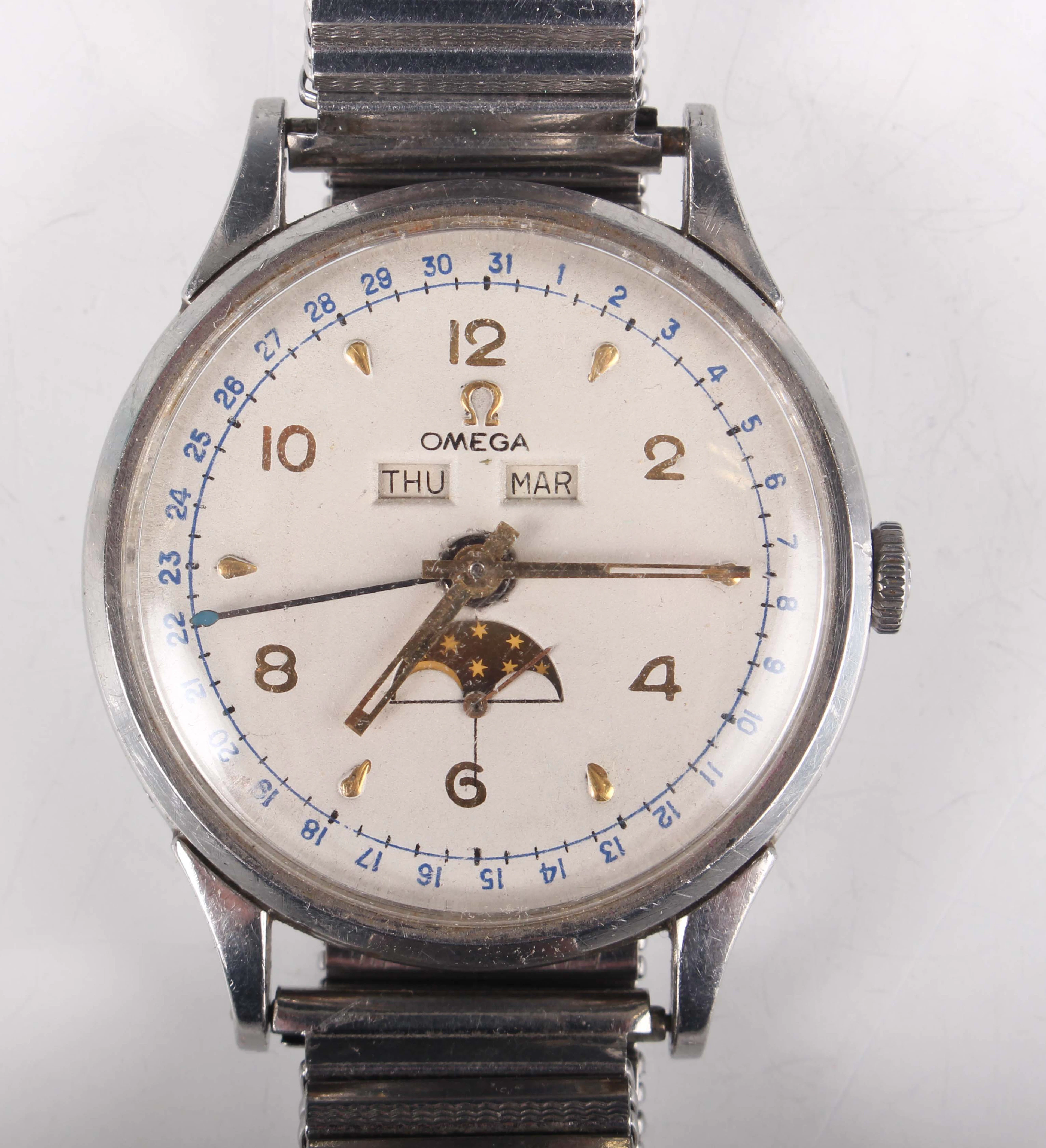 An Omega Cosmic Triple Calendar steel cased gentleman's wristwatch