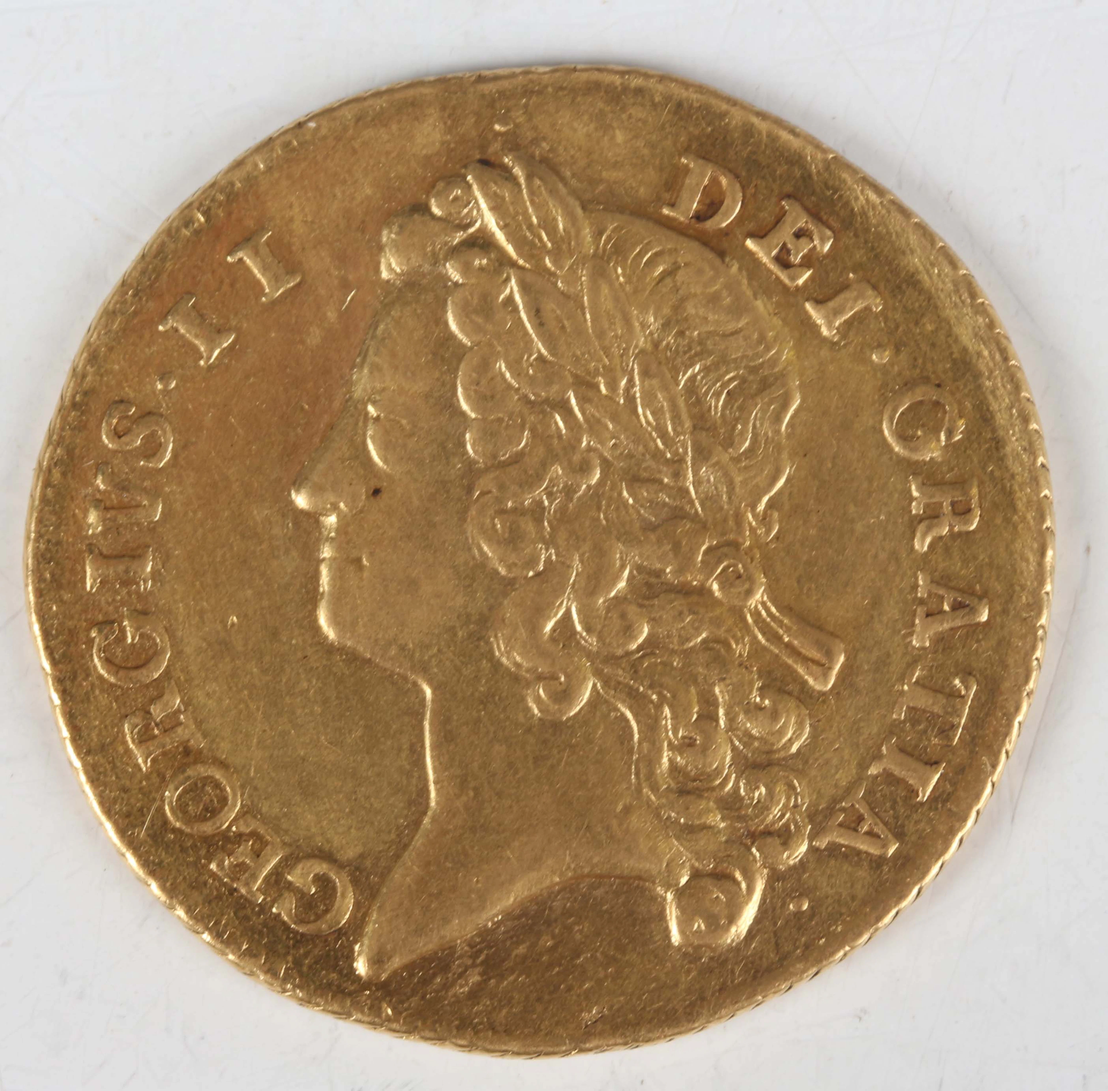 A scarce George II two guineas 1735, crown with pointed arches, Sp