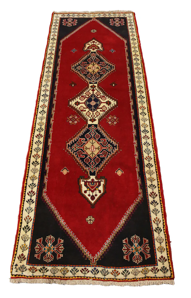 A South-west Persian runner, late 20th century, the claret field with