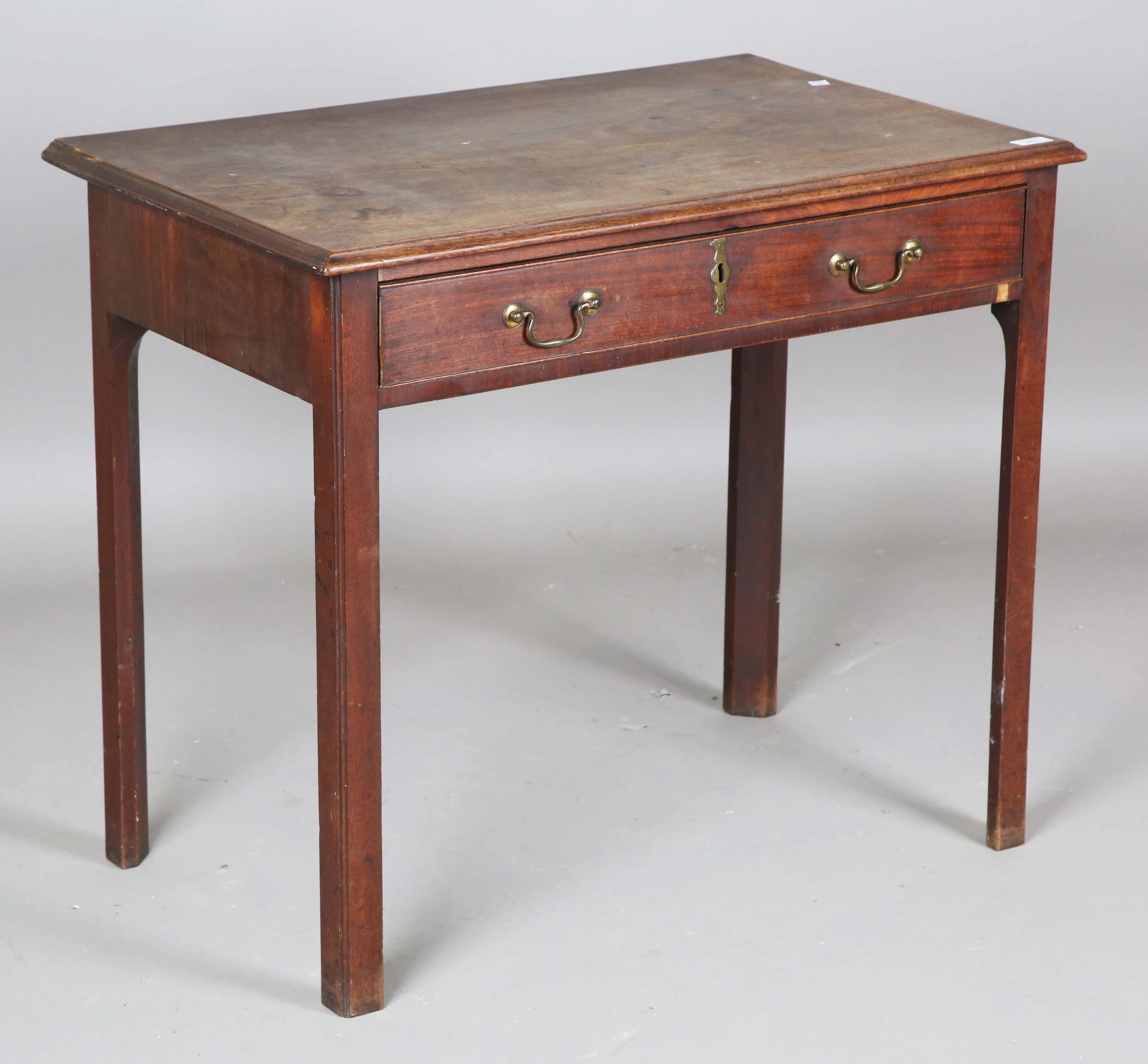 A George III mahogany side table, the moulded top above a single oak-lined