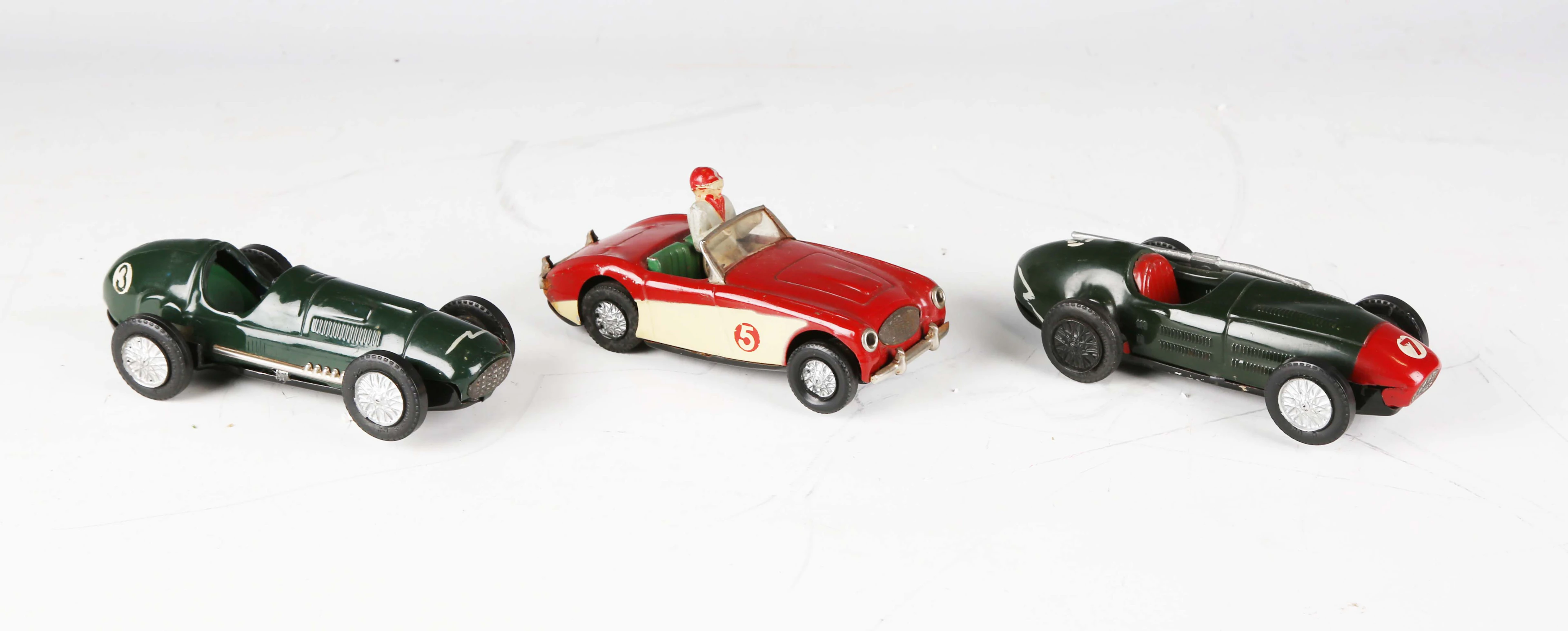 Three Scalextric tinplate cars, comprising Austin Healey, Maserati