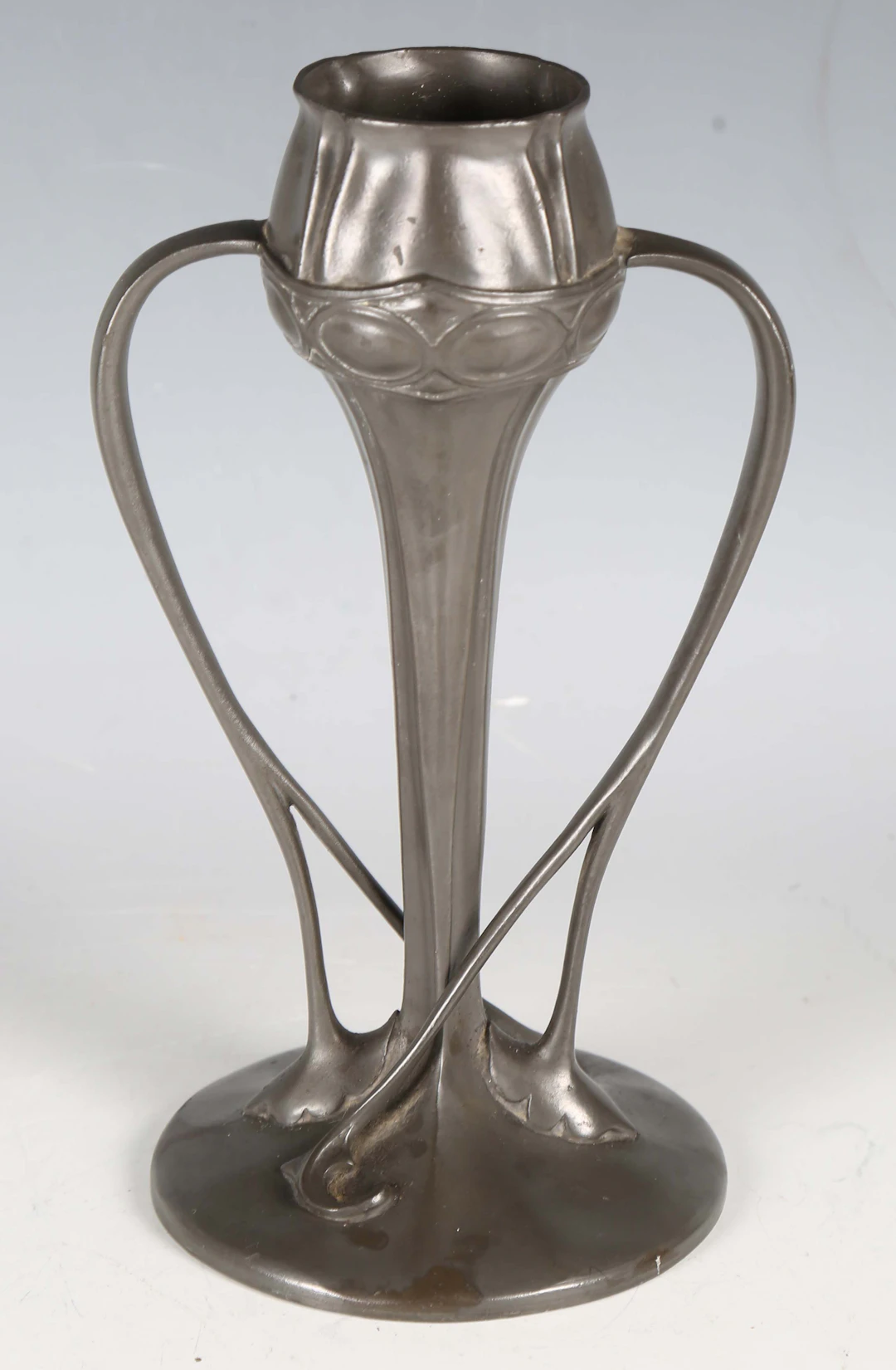 A Liberty & Co 'Tudric' pewter twin-handled vase, designed by Archibald