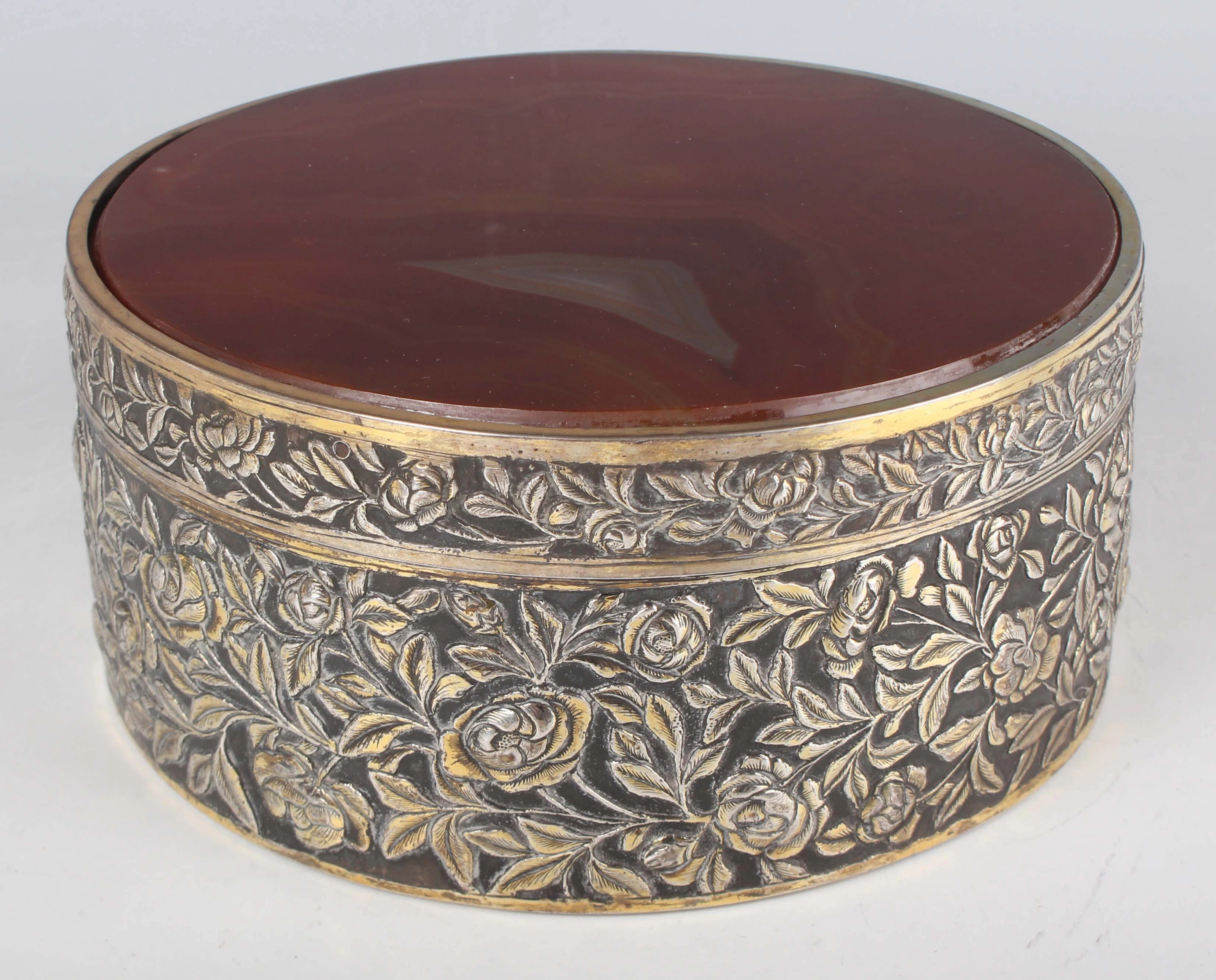A Chinese export silver gilt circular box and cover by Da Xing, late