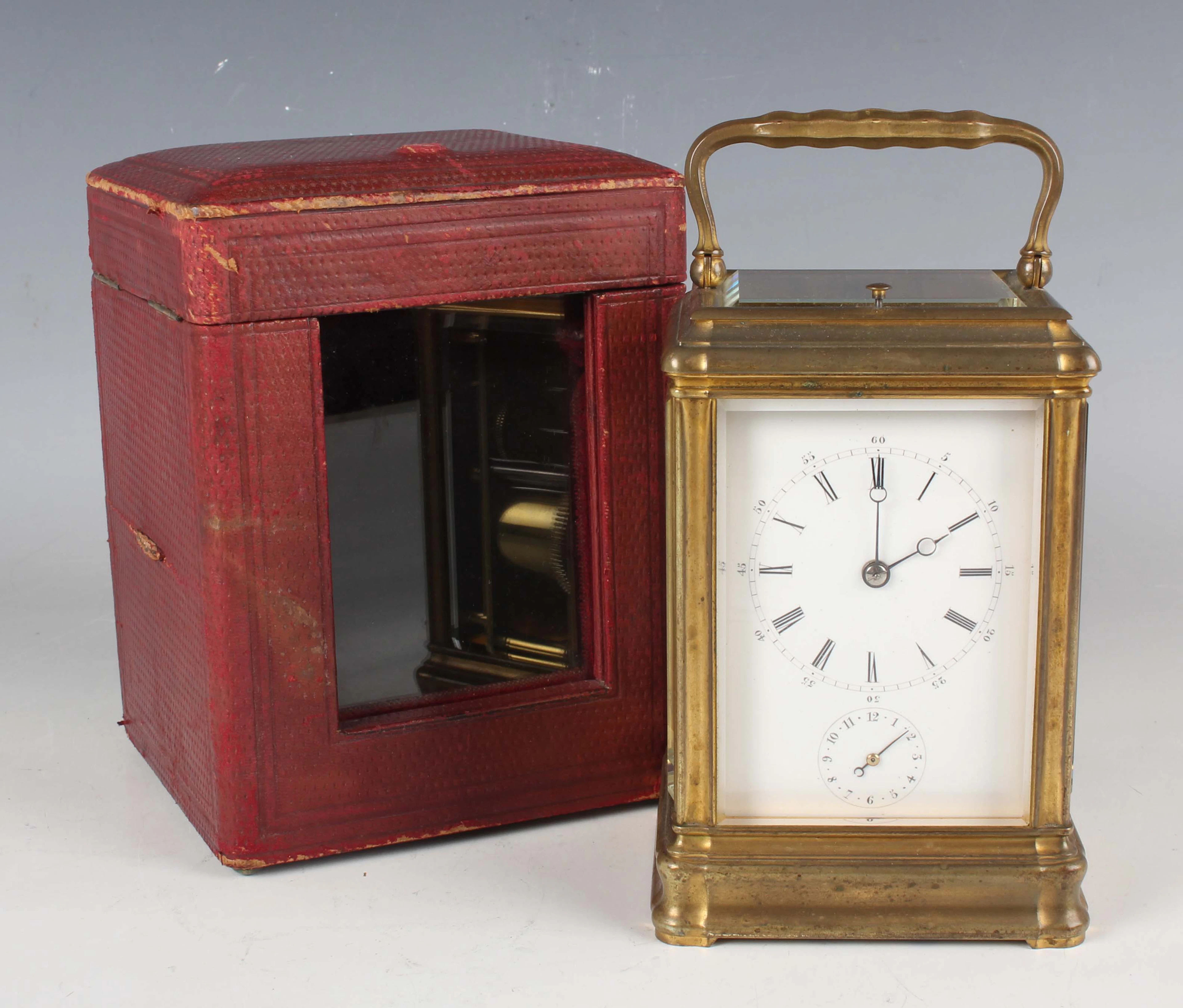 A late 19th century French brass gorge cased carriage alarm clock