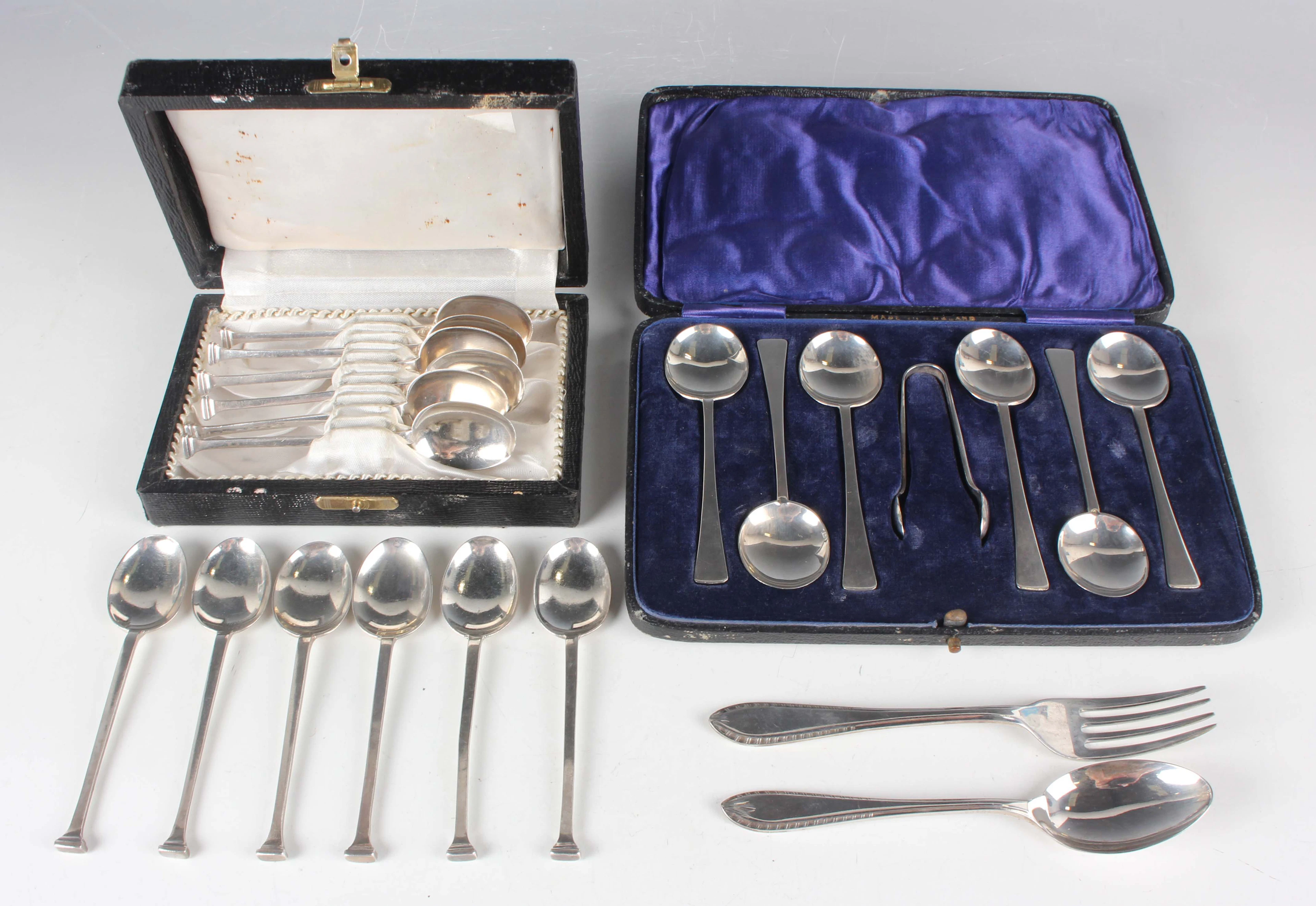 A set of twelve George V silver nail-end coffee spoons, Sheffield