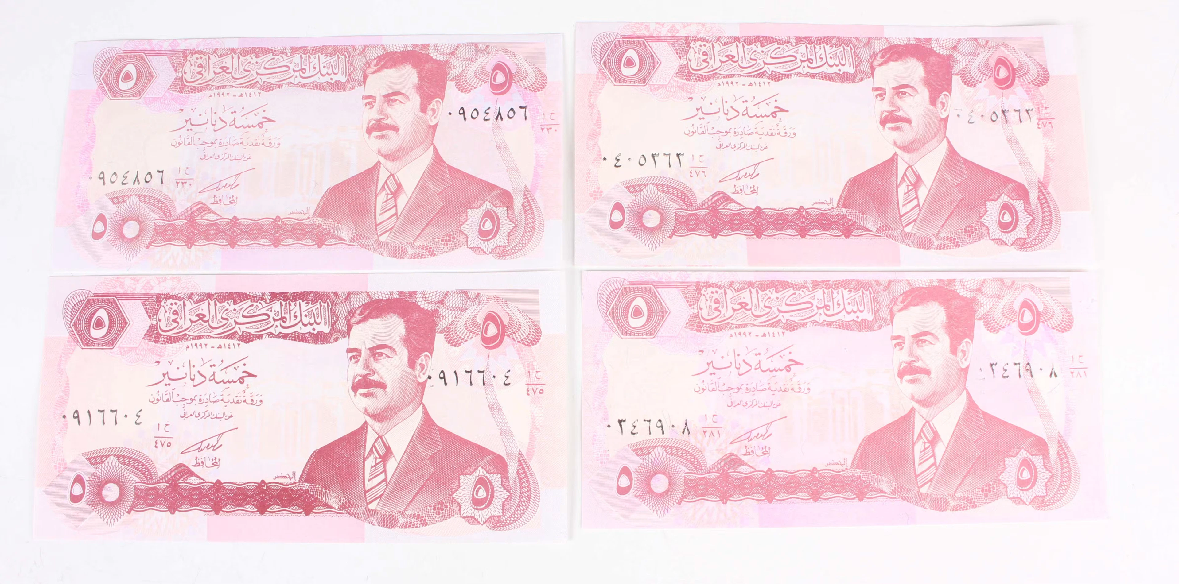 A large collection of Middle Eastern banknotes, including Afghanistan