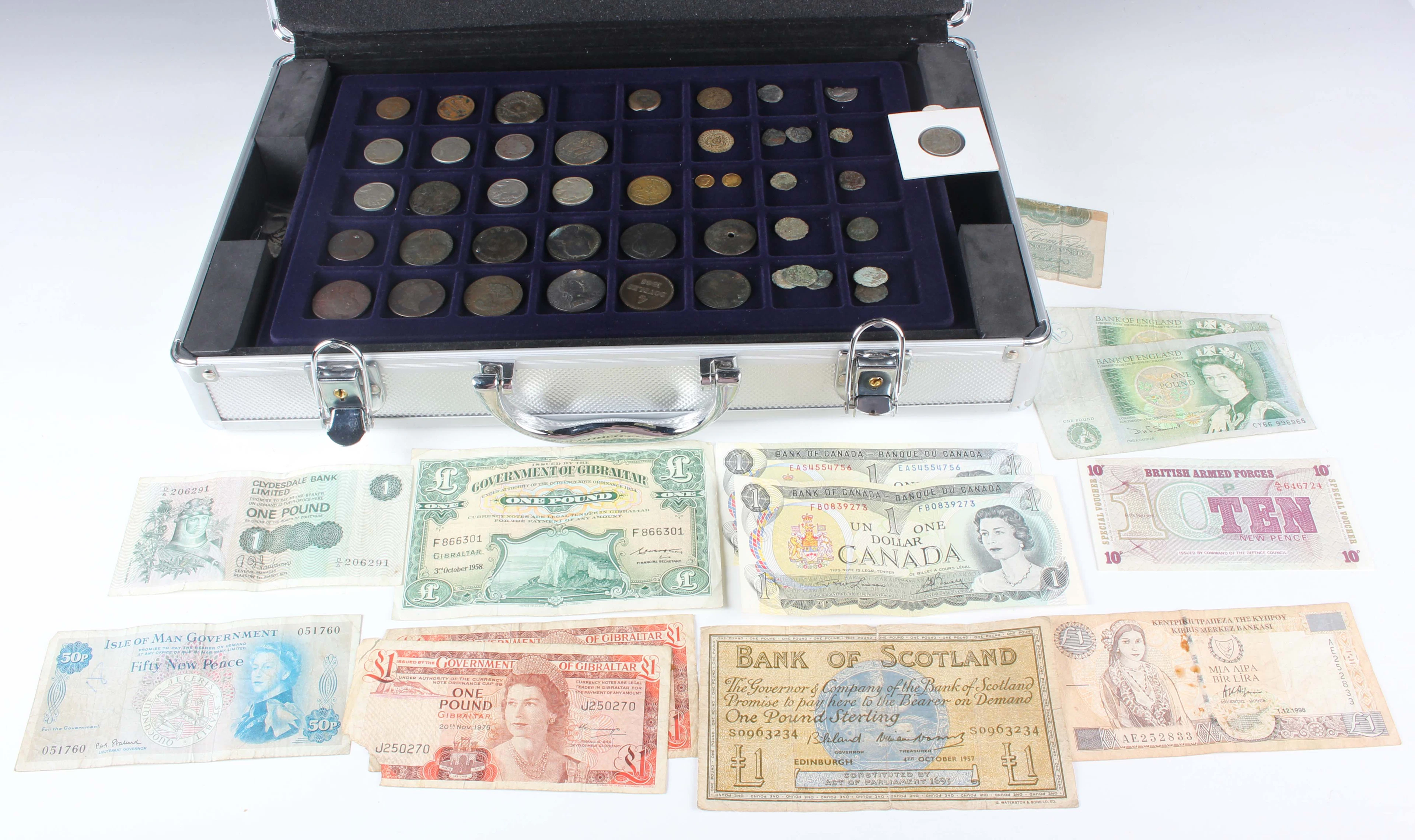 A collection of mixed coins and commemoratives, including a collection