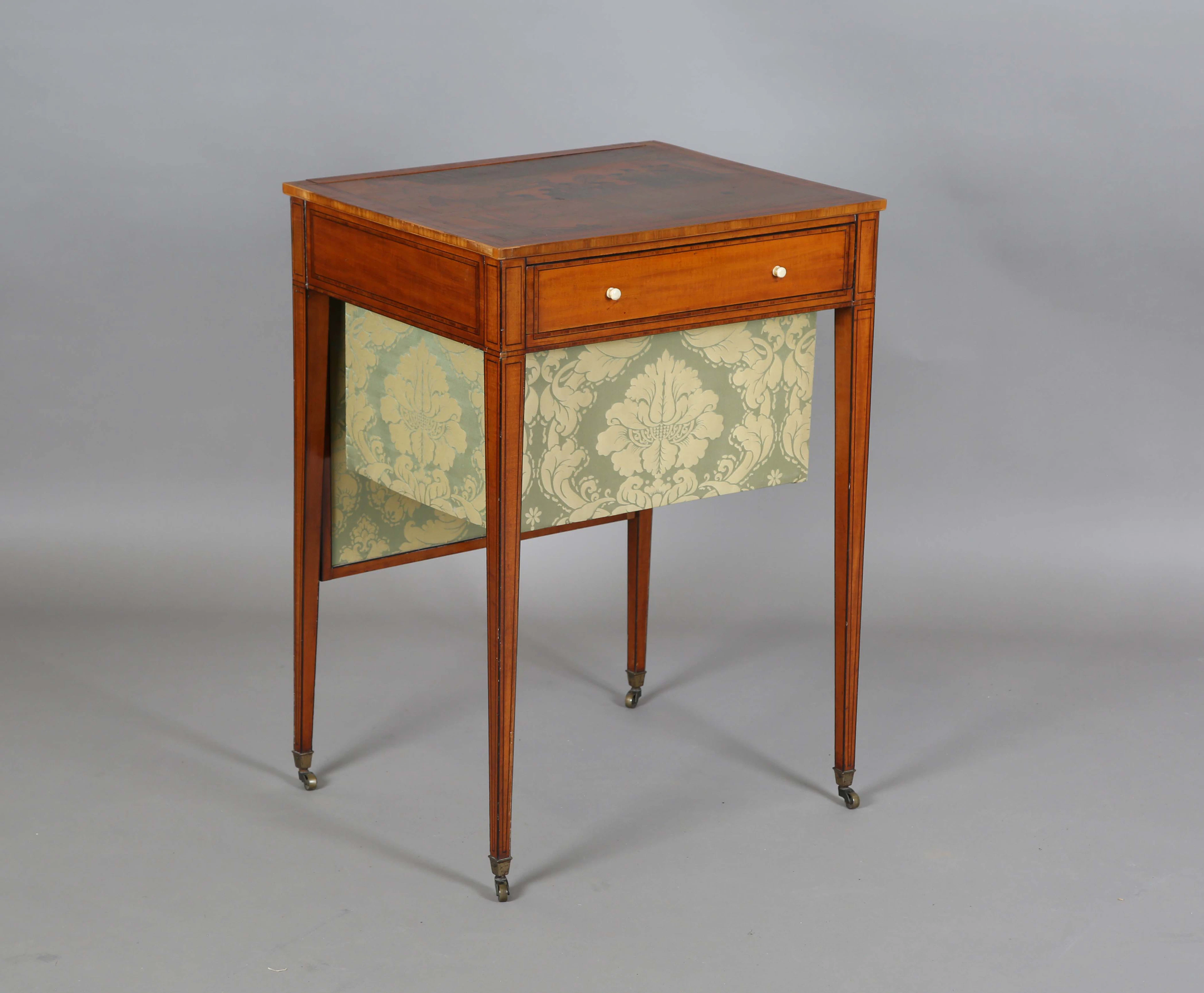 A 19th century Neoclassical Revival satinwood work table, the top