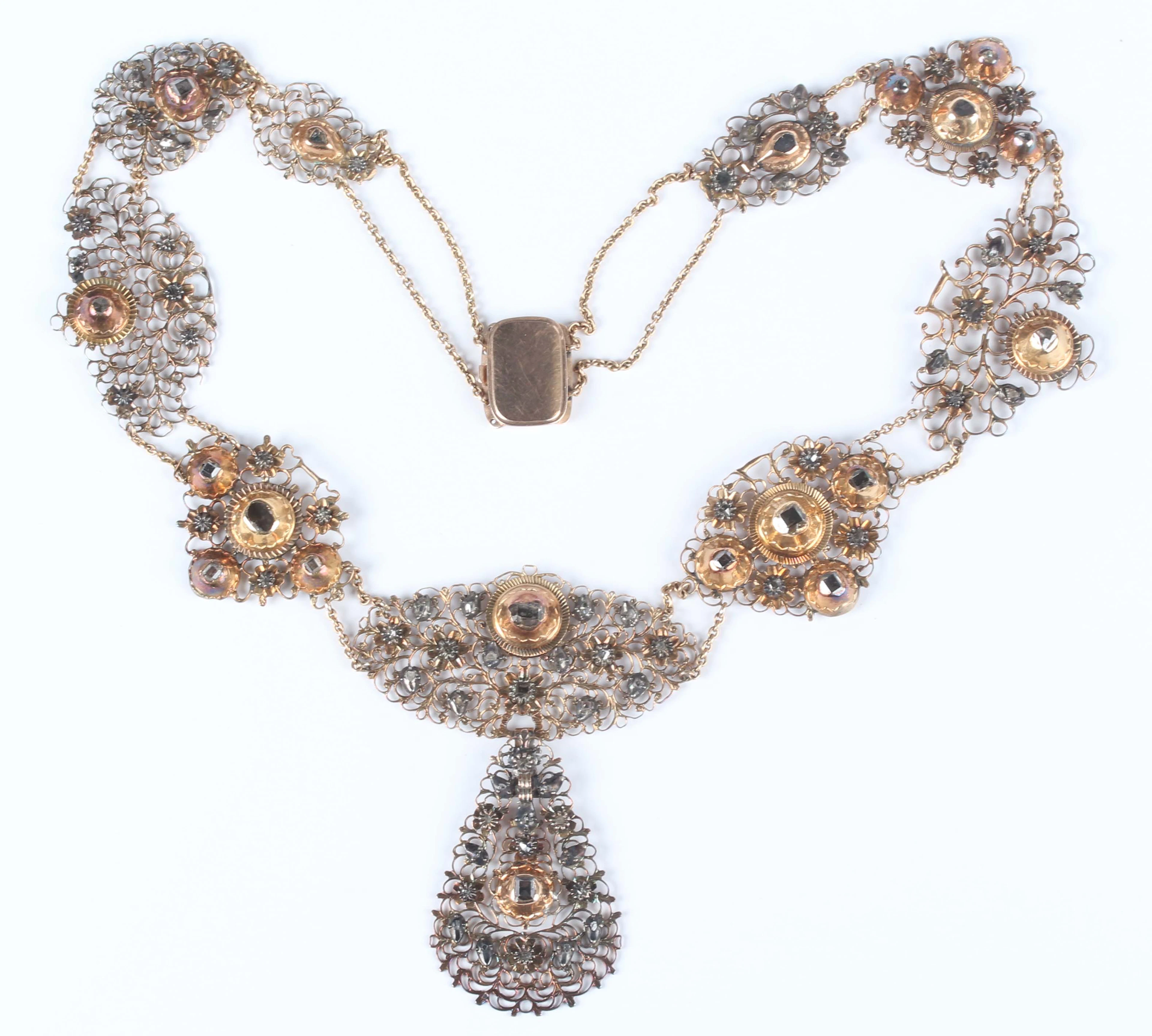 A gold backed, silver set and diamond collar necklace, first quarter
