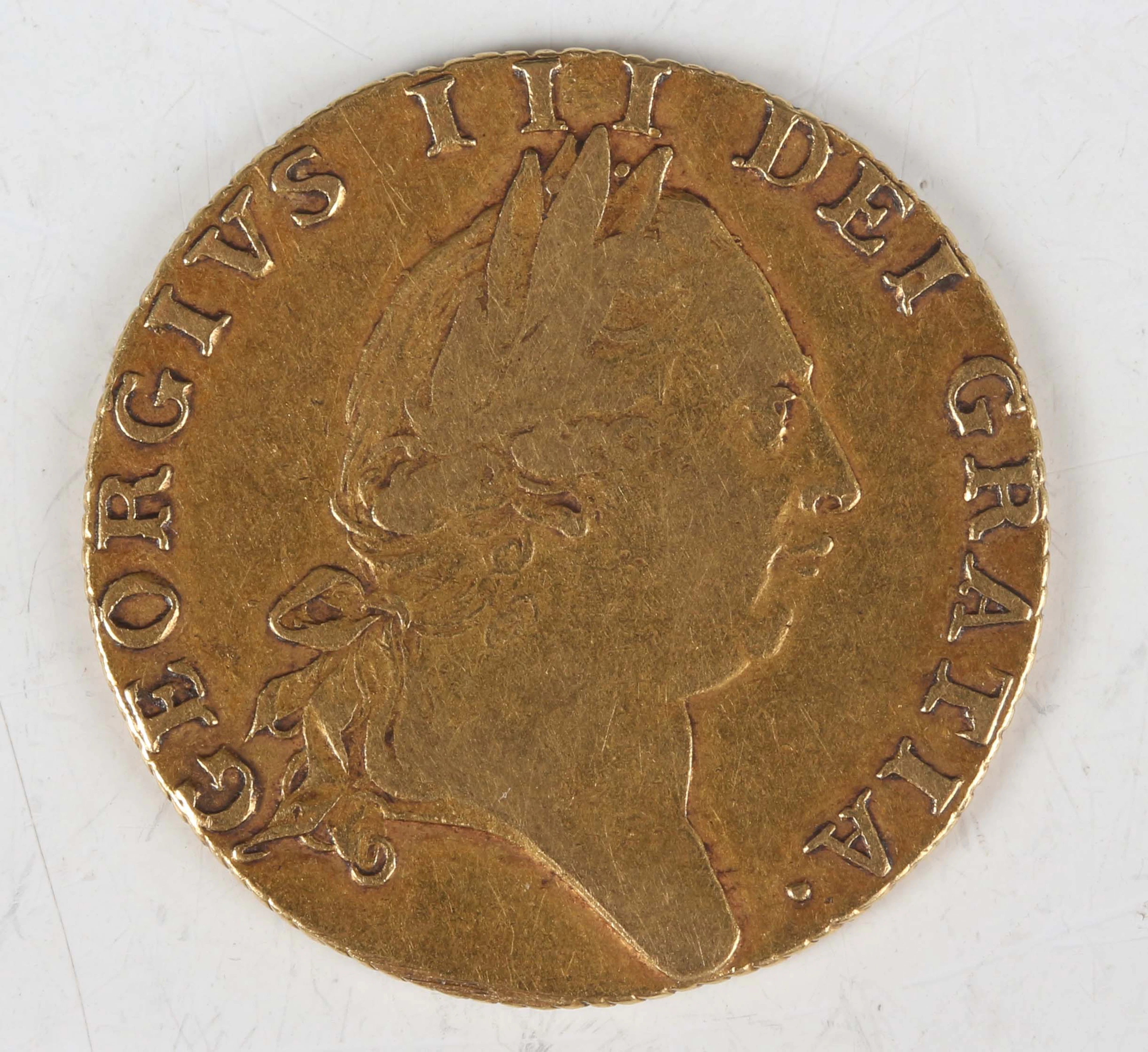 A George III spade guinea 1788, fifth laureate head, Sp 3729 (good/fine).