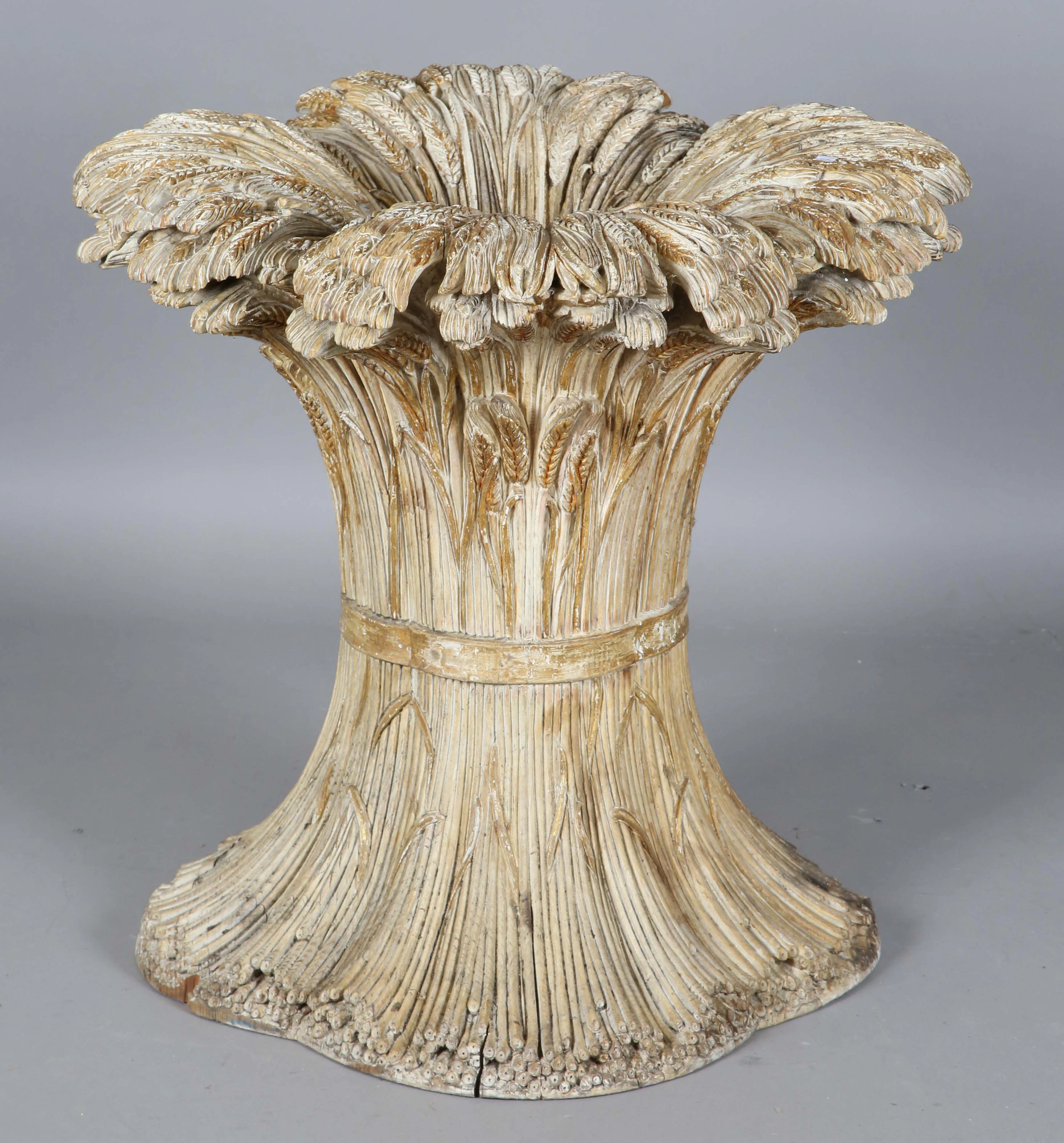 A late 20th century Italian carved softwood table base, in the manner
