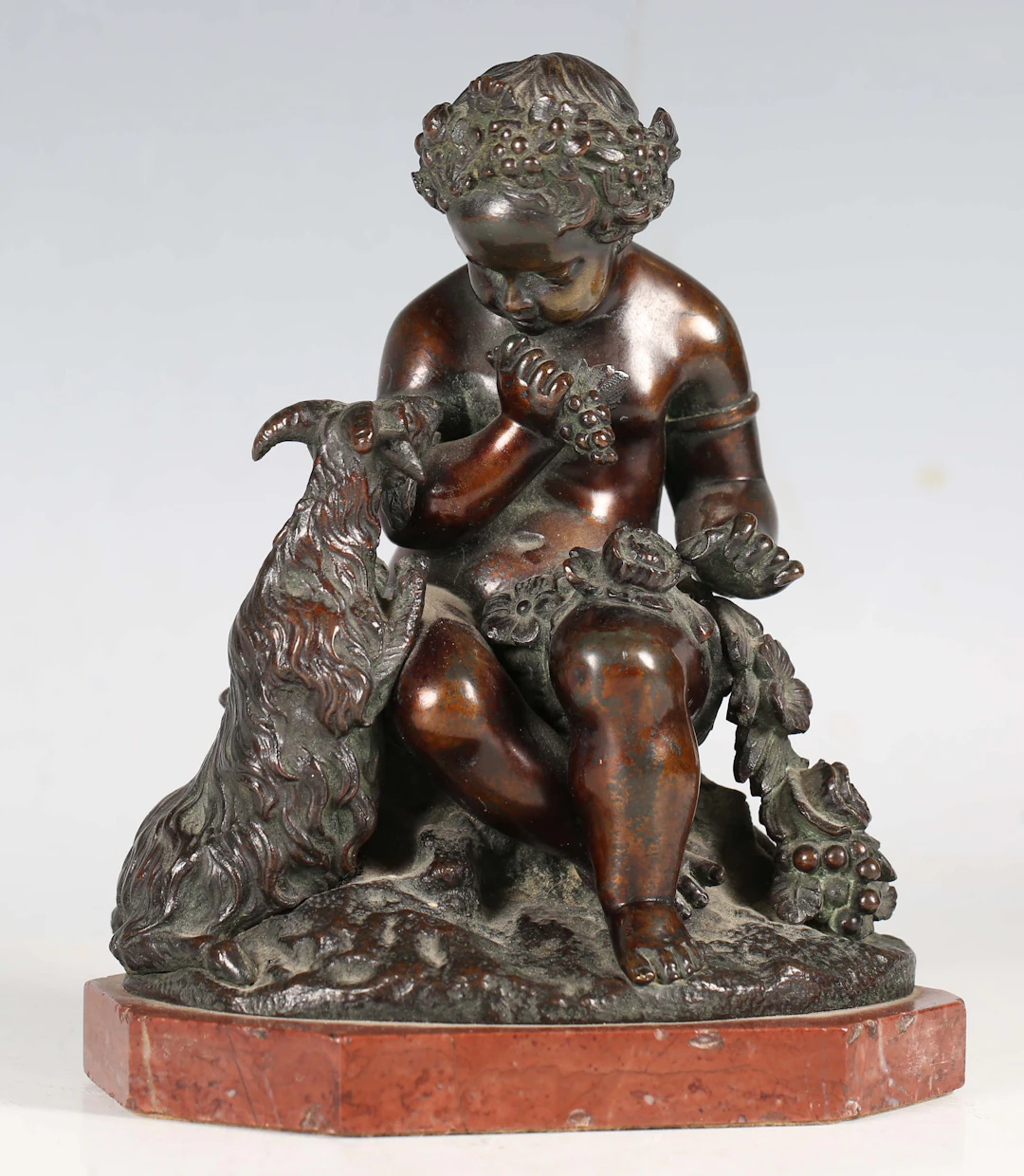 In the manner of Alfred Boucher - a late 19th century brown patinated