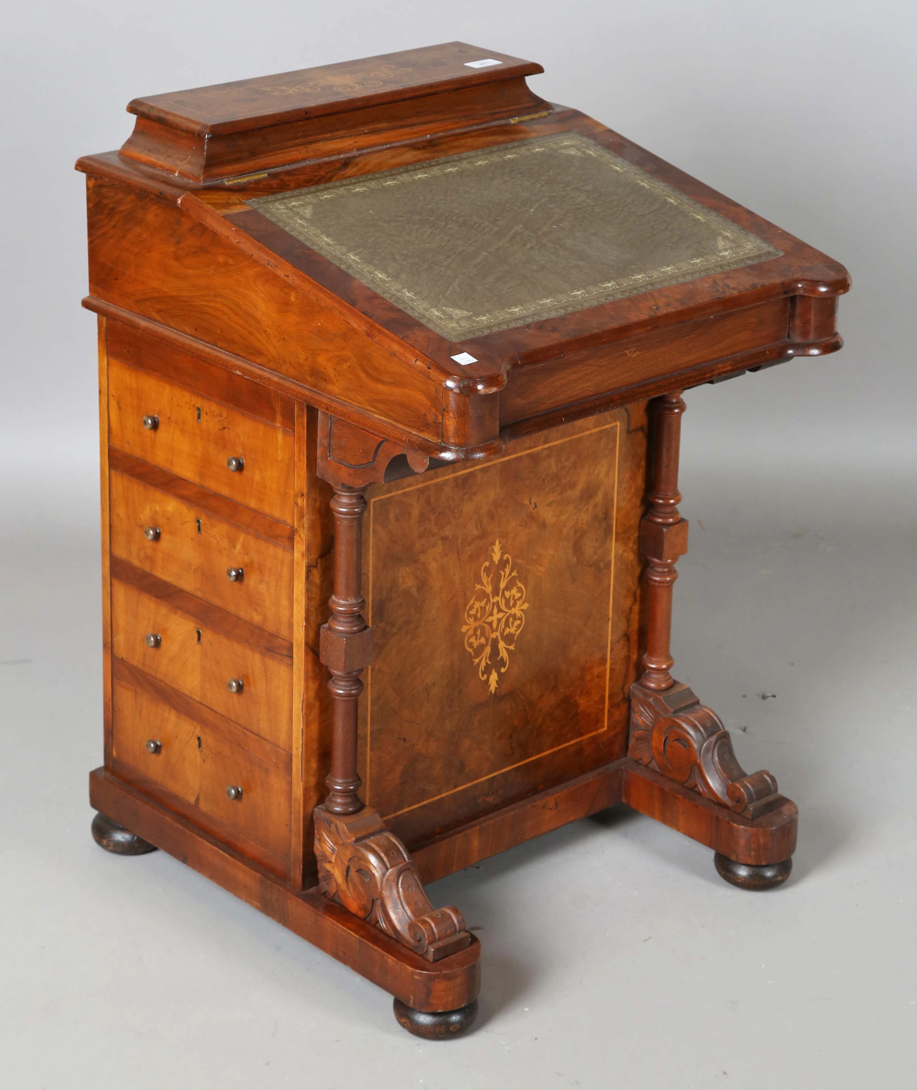 A 20th century Victorian style walnut Davenport with foliate inlay
