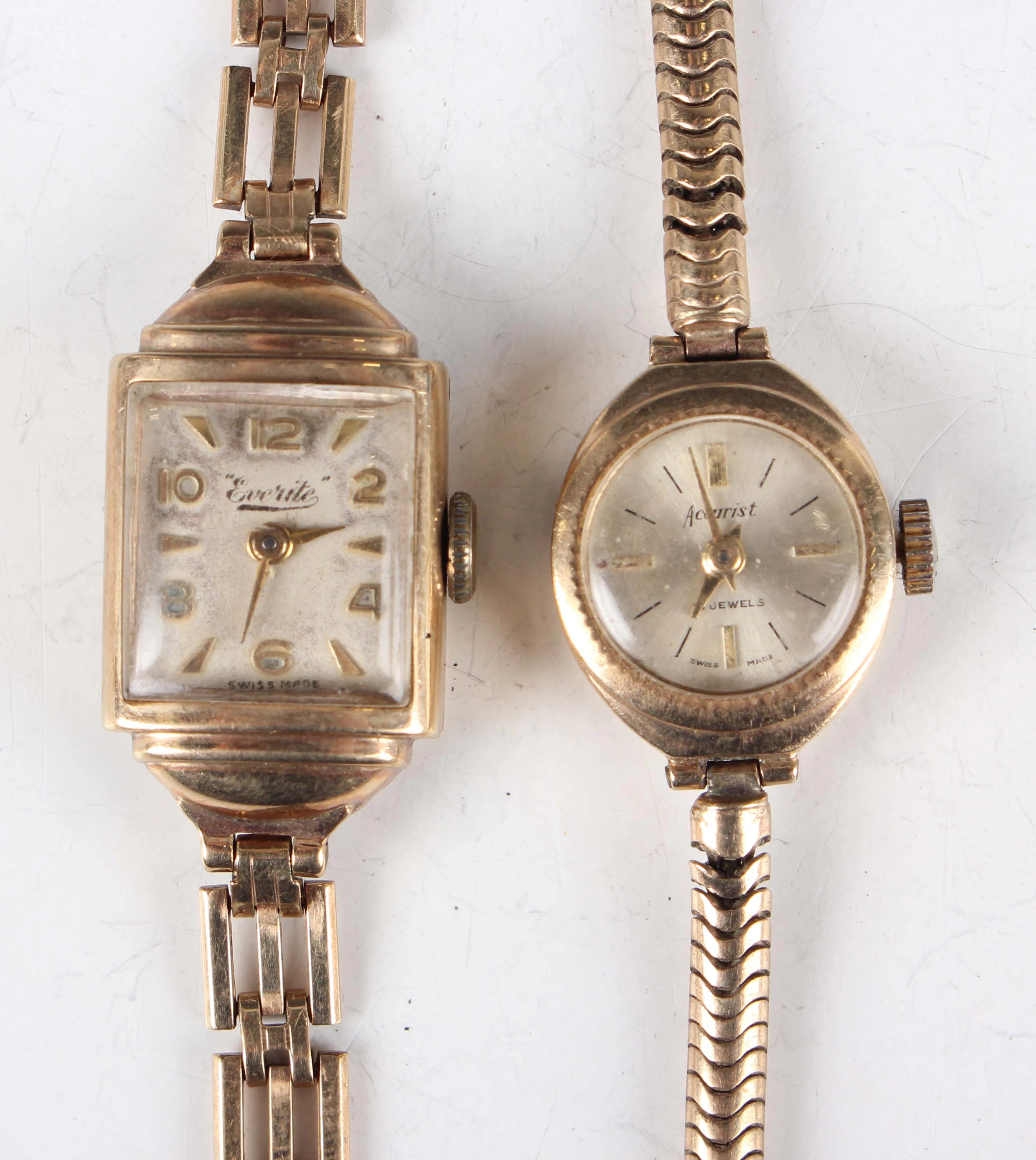 An Accurist 9ct gold lady's bracelet wristwatch with signed silvered