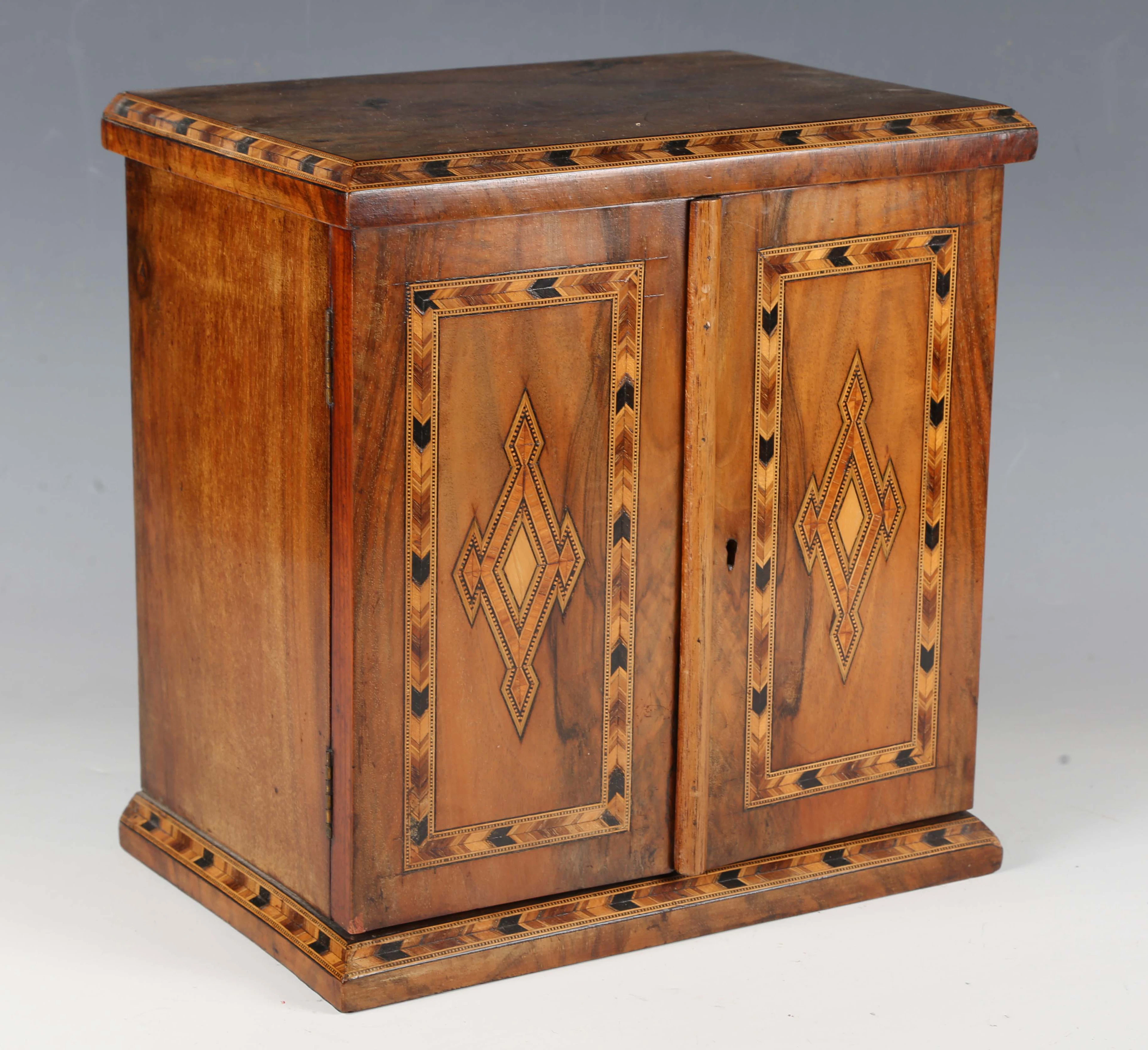 A late Victorian walnut table-top collector's chest with inlaid geometric