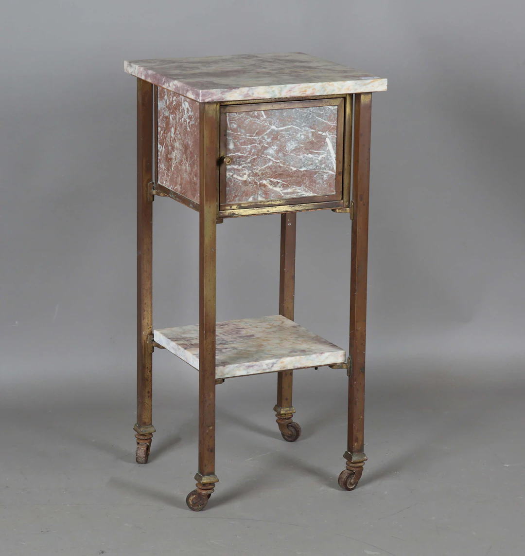 An unusual early 20th century French gilt brass and marble bedside