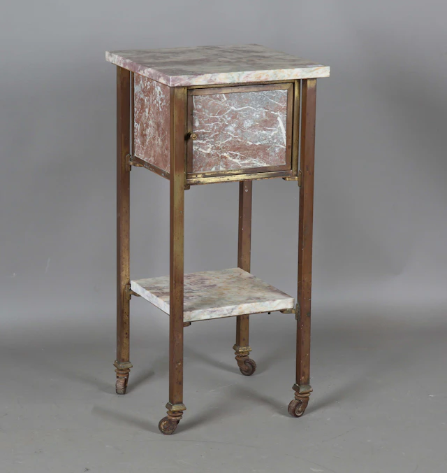 An unusual early 20th century French gilt brass and marble bedside