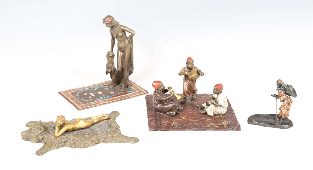 A group of four Franz Bergmann style cold painted cast bronze figures