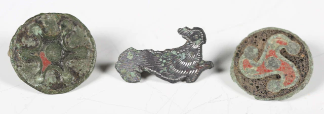 A group of three Romano-British brooches, comprising two enamelled