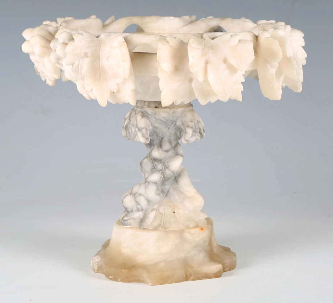 A late 19th/early 20th century Continental carved alabaster comport