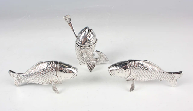 An Elizabeth II silver novelty three-piece condiment set, each in