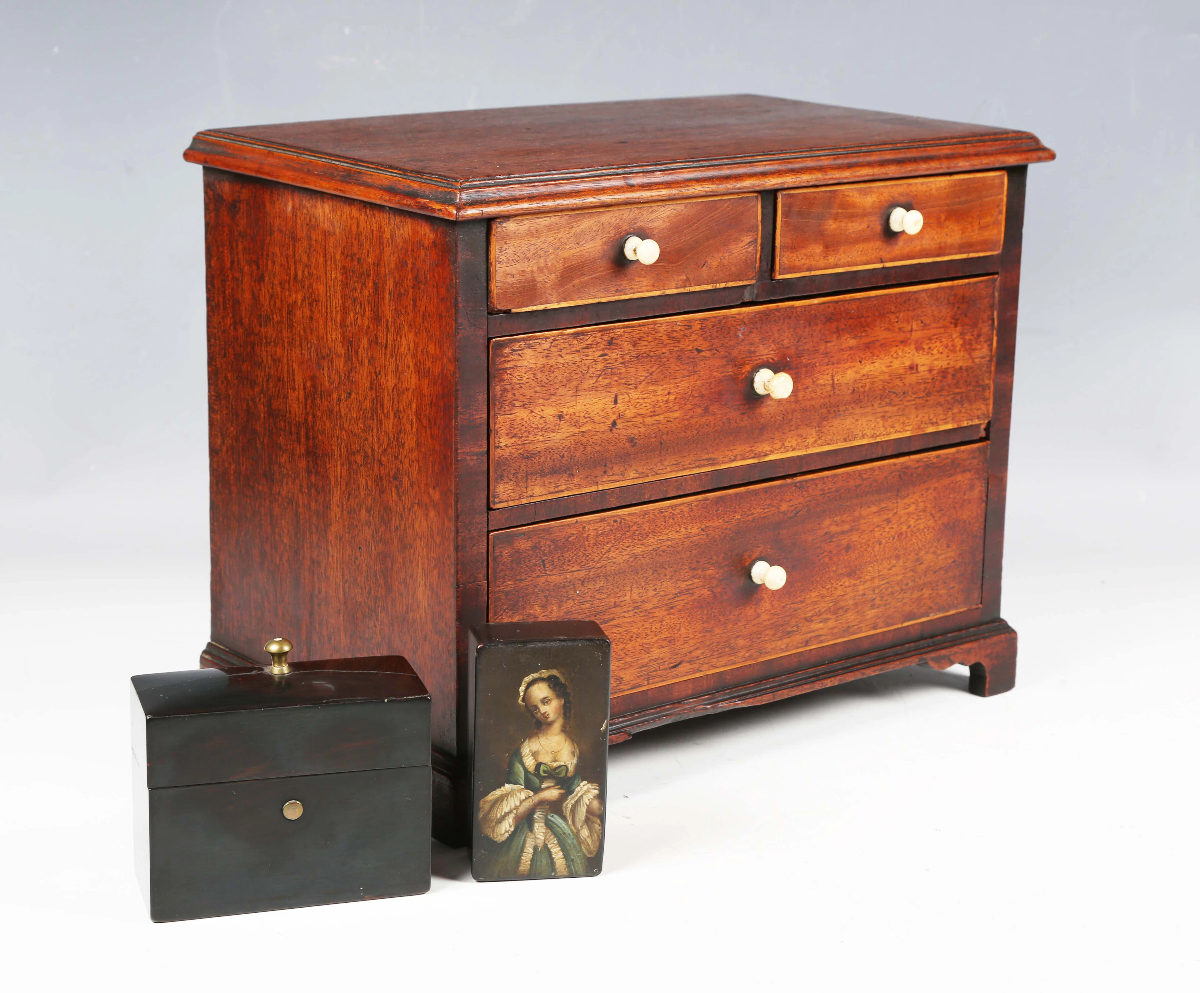 A George III mahogany table-top chest of oak-lined drawers, width