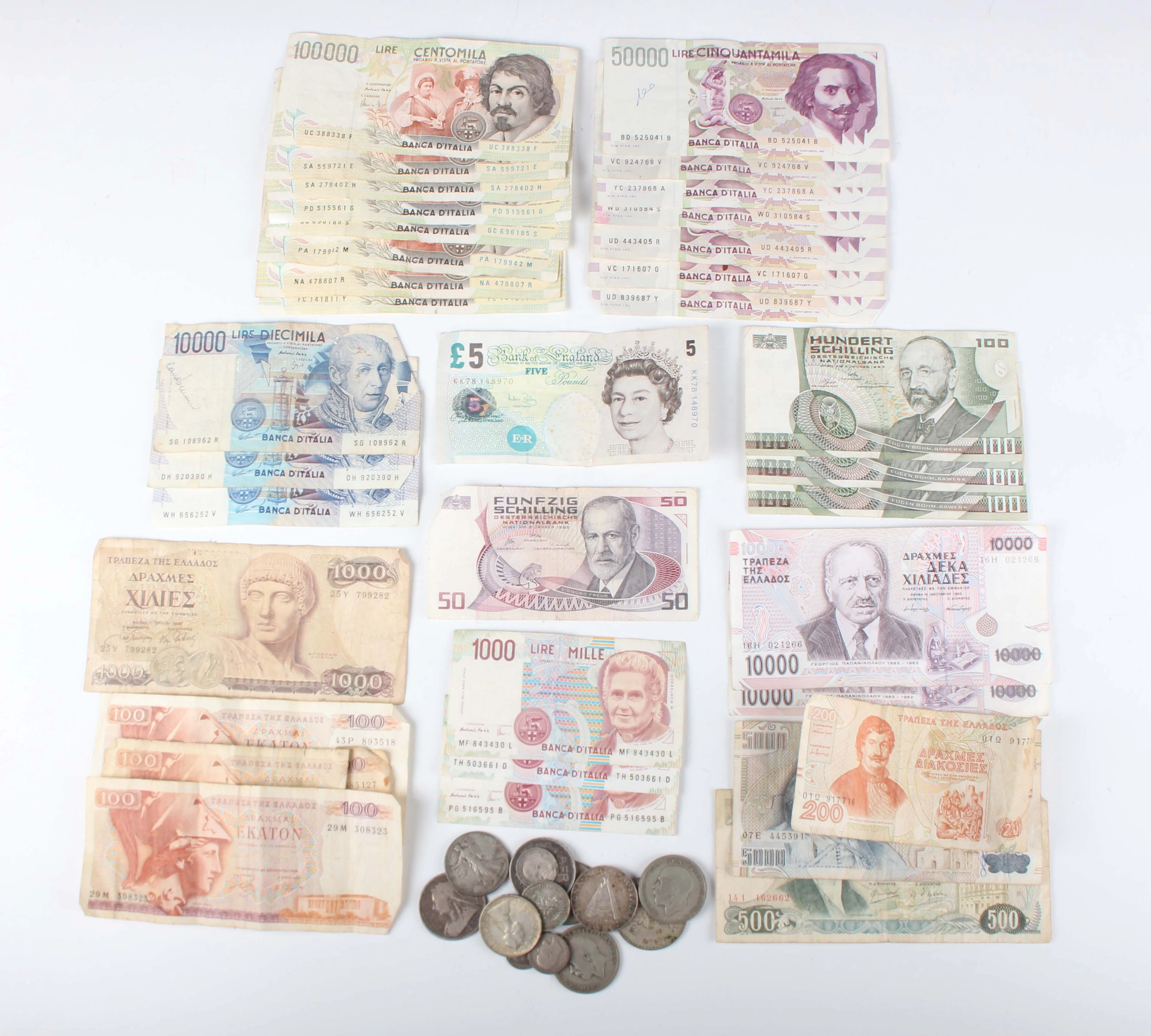 A small collection of mixed European and world coins and banknotes