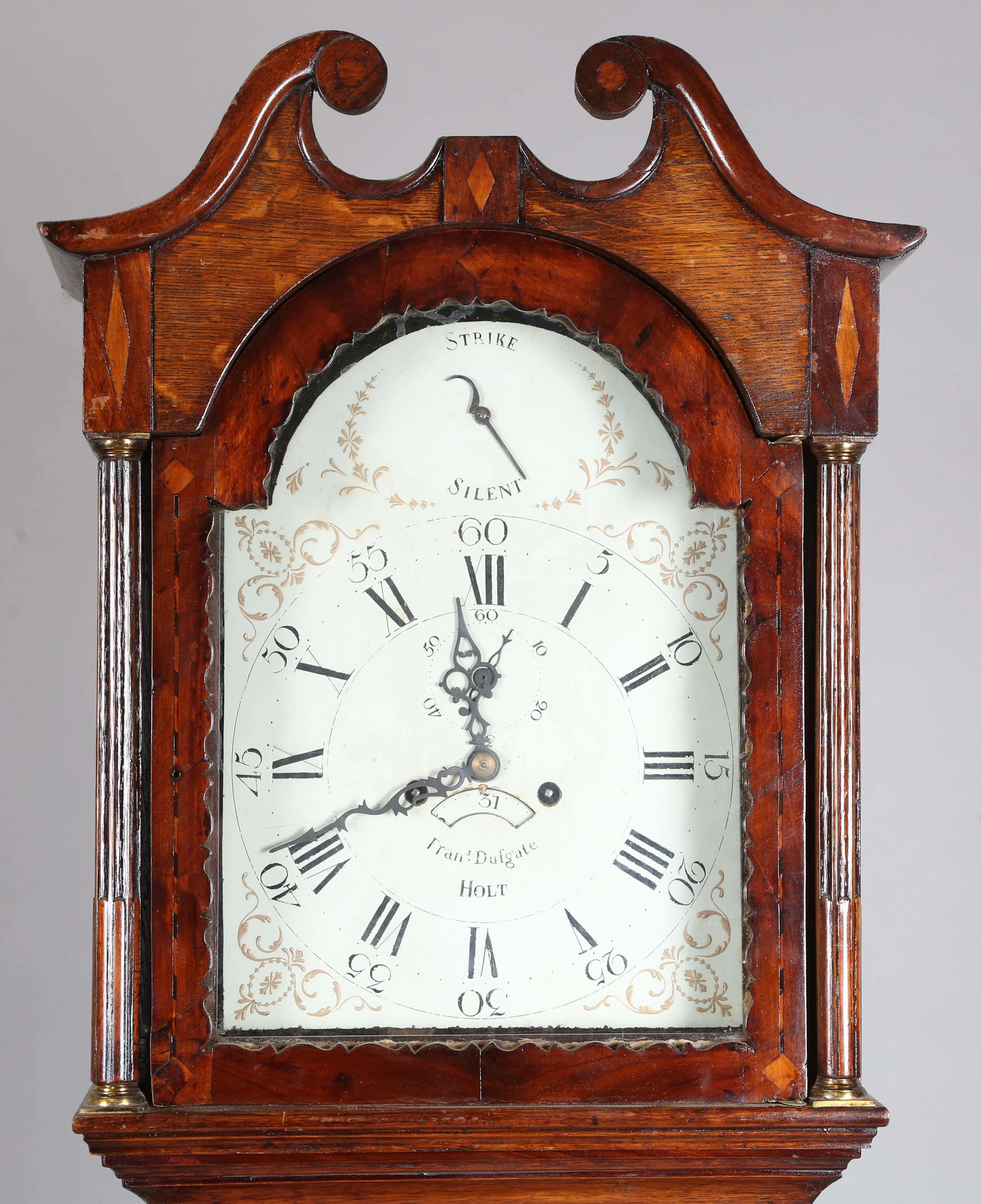 A George III oak and mahogany crossbanded longcase clock with eight