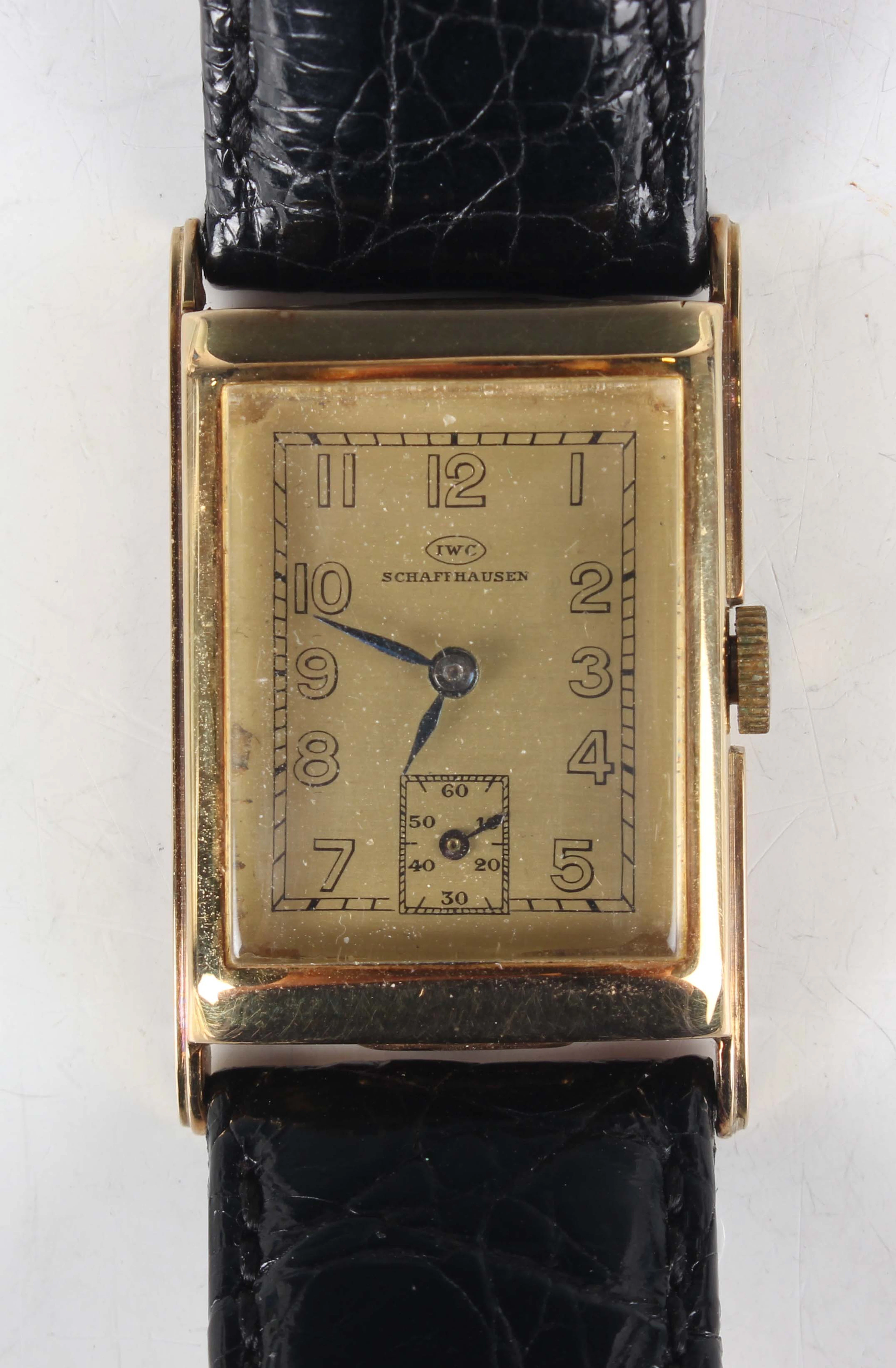 An IWC (International Watch Co) 14K gold rectangular cased gentleman's