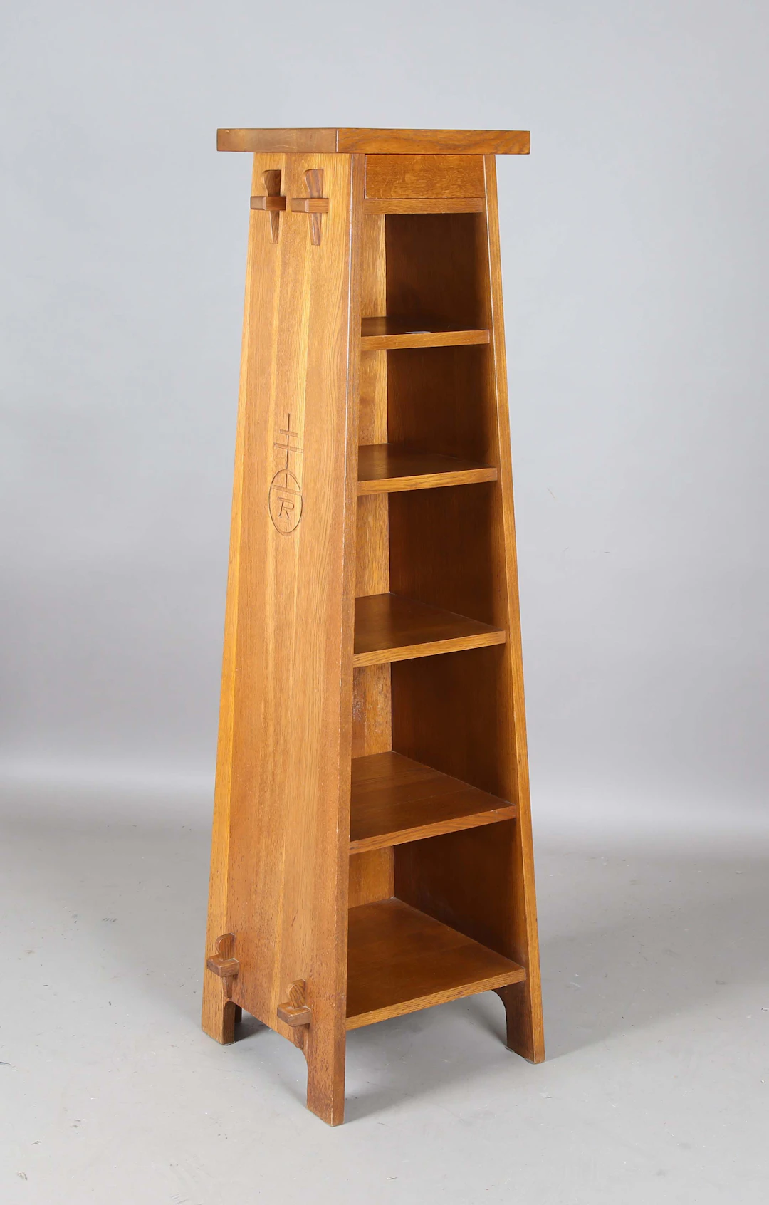 An L. & J.G. Stickley 'Roycroft Collection' solid oak five-tier open
