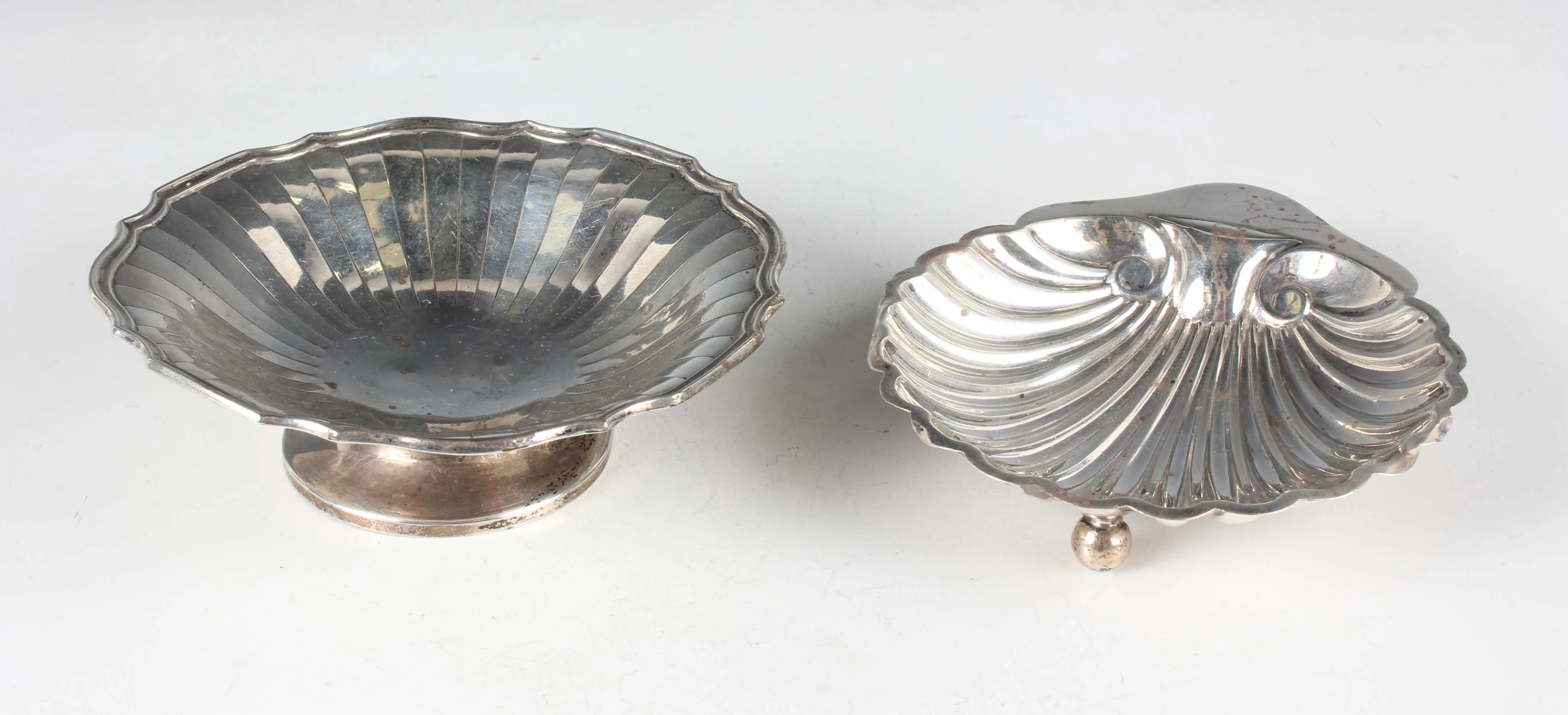 A George V silver butter shell, raised on ball feet, Sheffield 1913